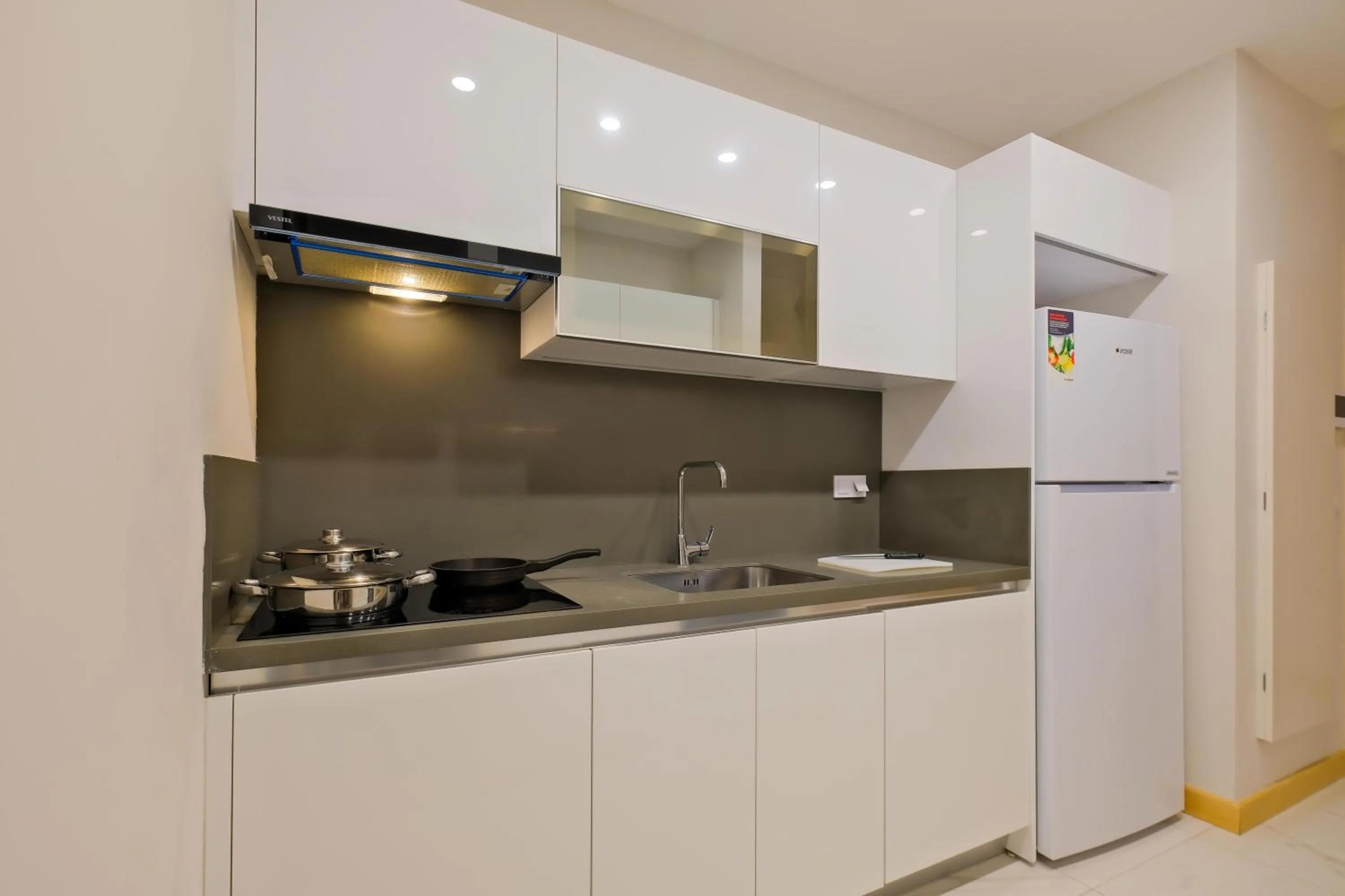 kitchen in Grand Residence by NewInn