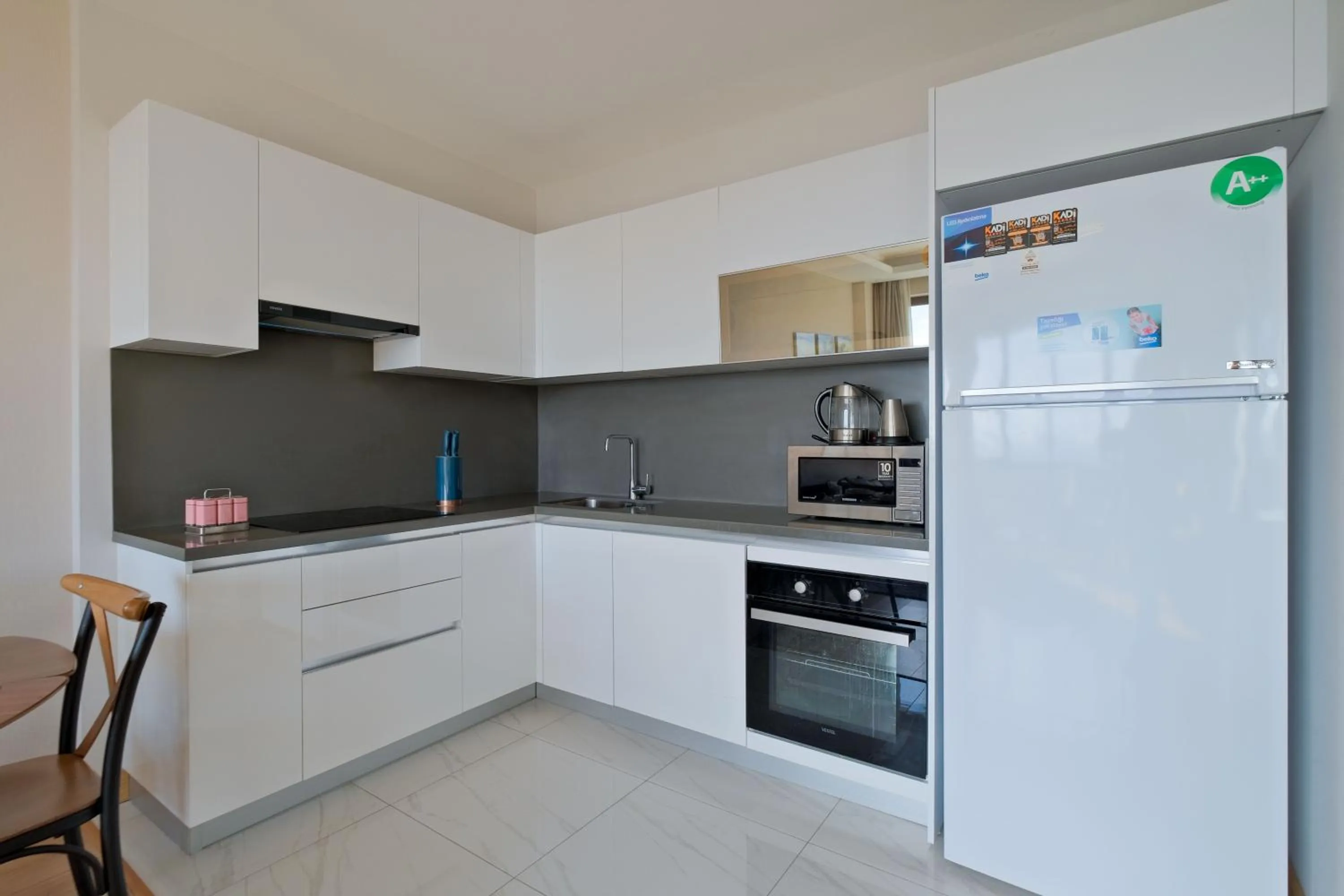 kitchen in Grand Residence by NewInn