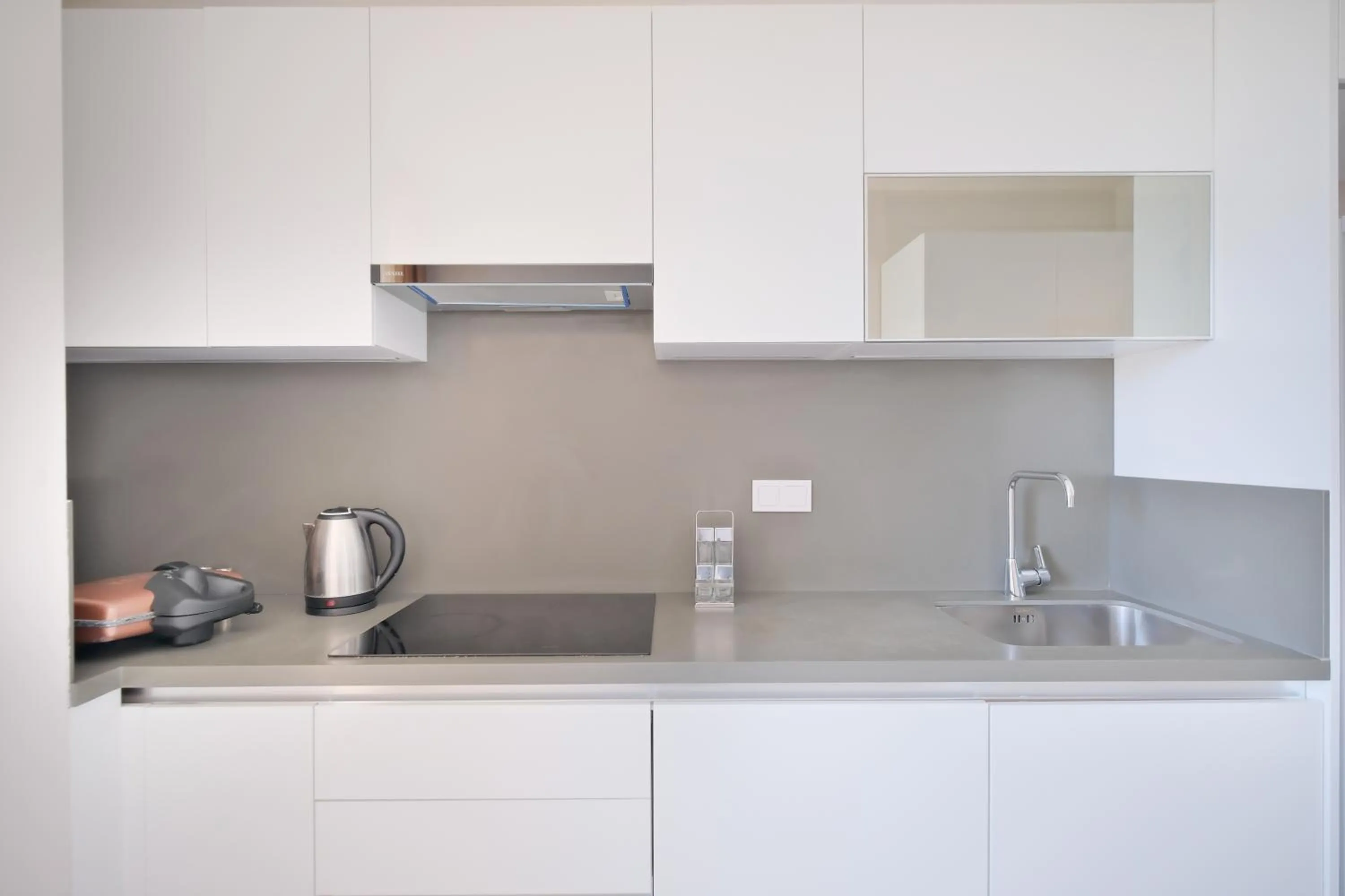 kitchen in Grand Residence by NewInn