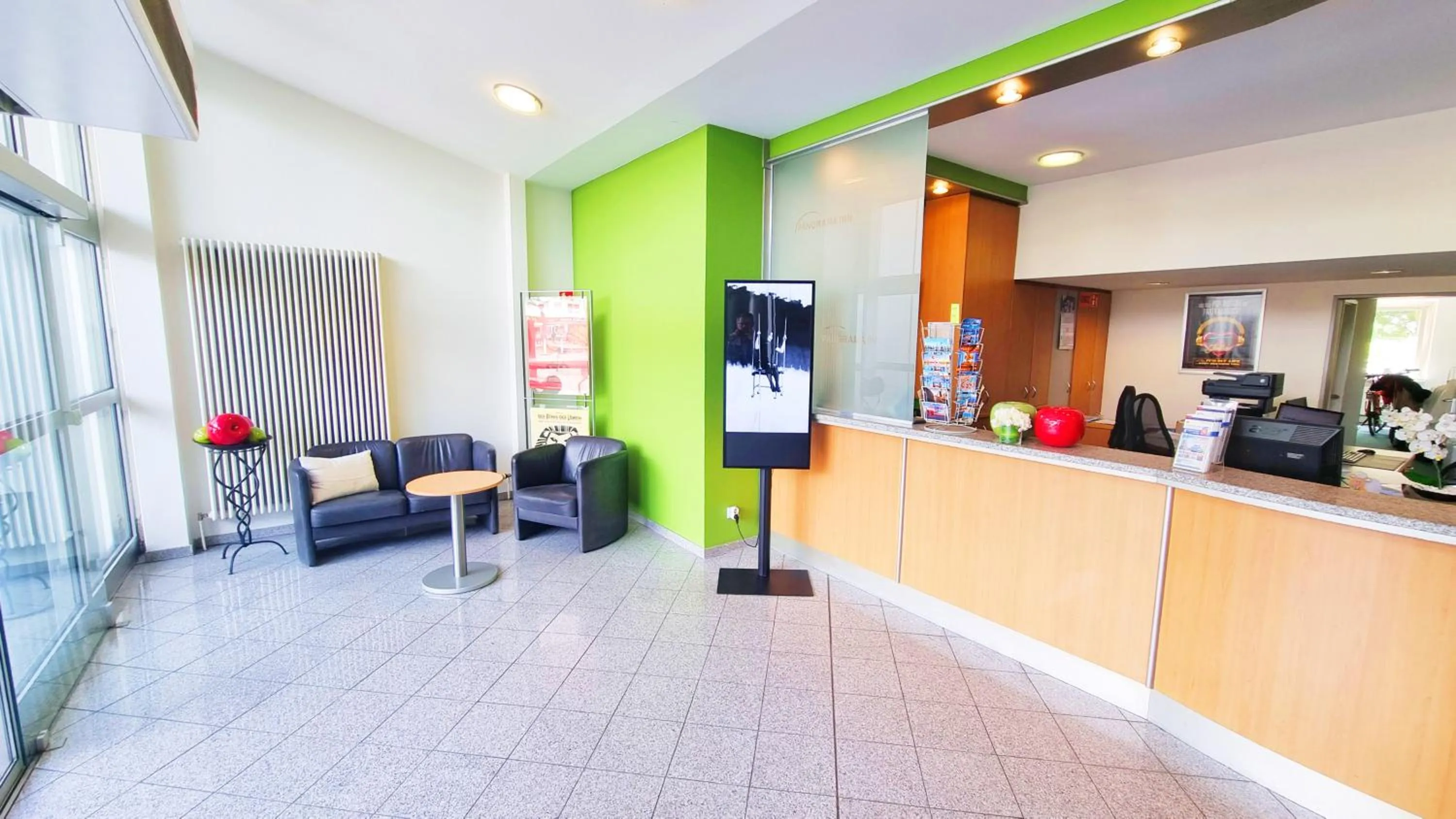 Lobby or reception in Panorama Inn Hotel und Boardinghaus