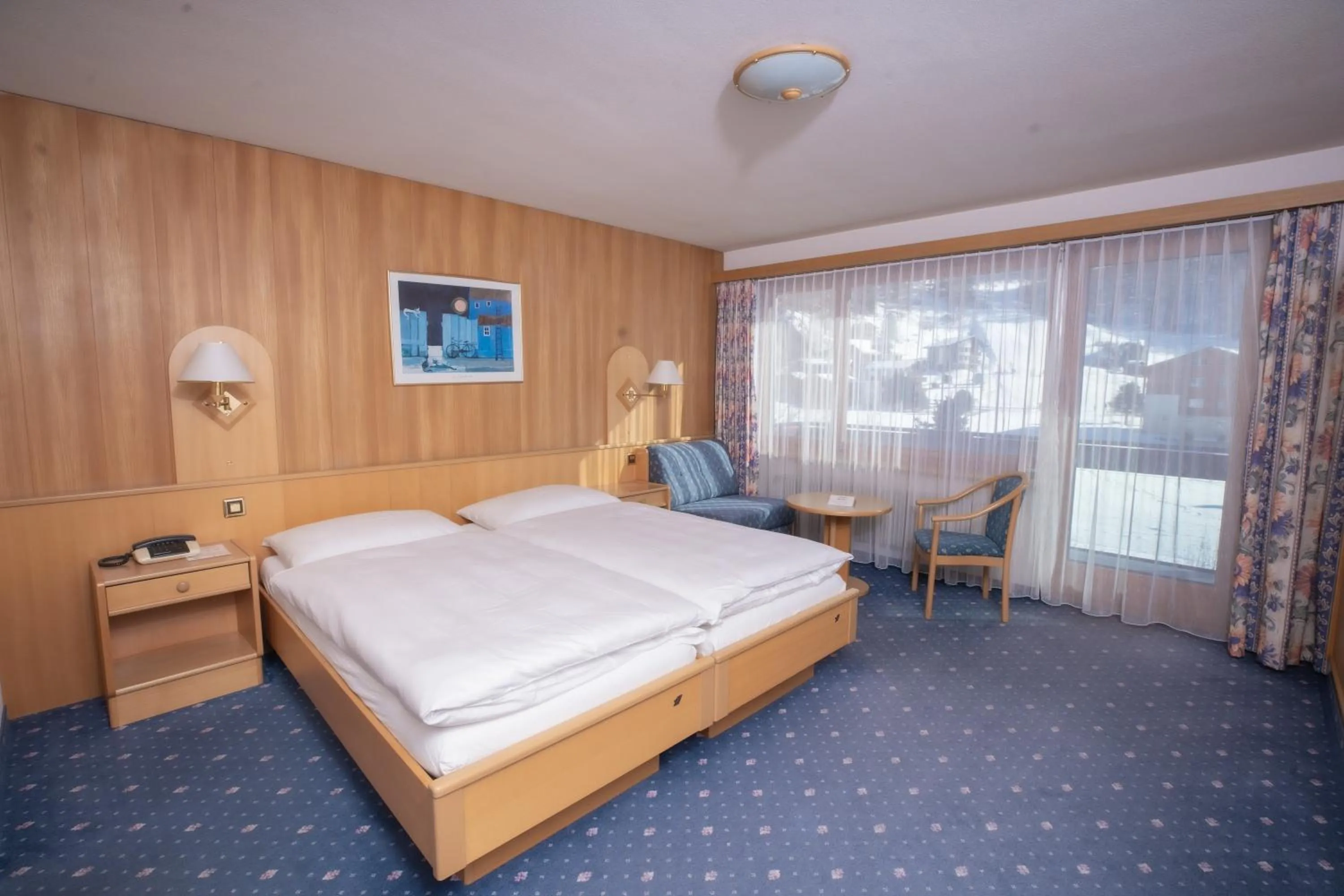 Bed in Hotel Alpenhof