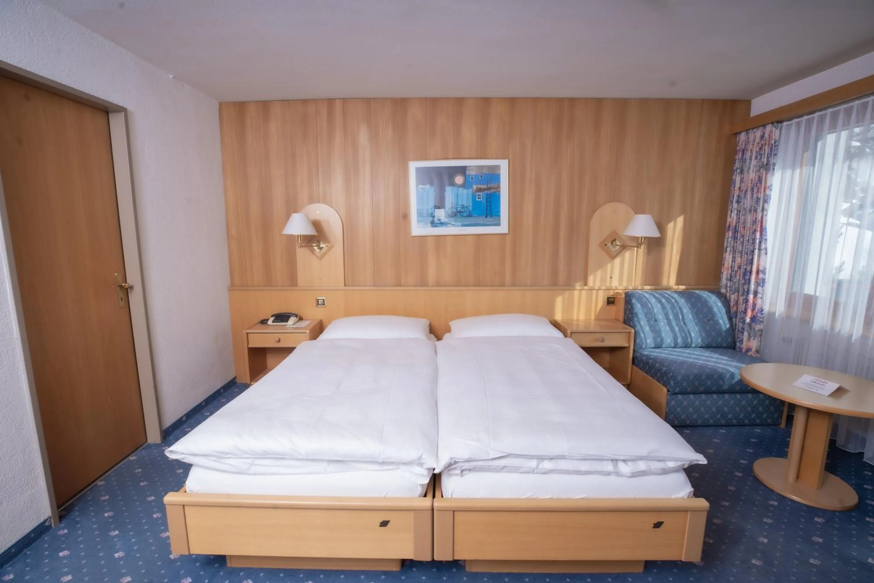 Bed in Hotel Alpenhof