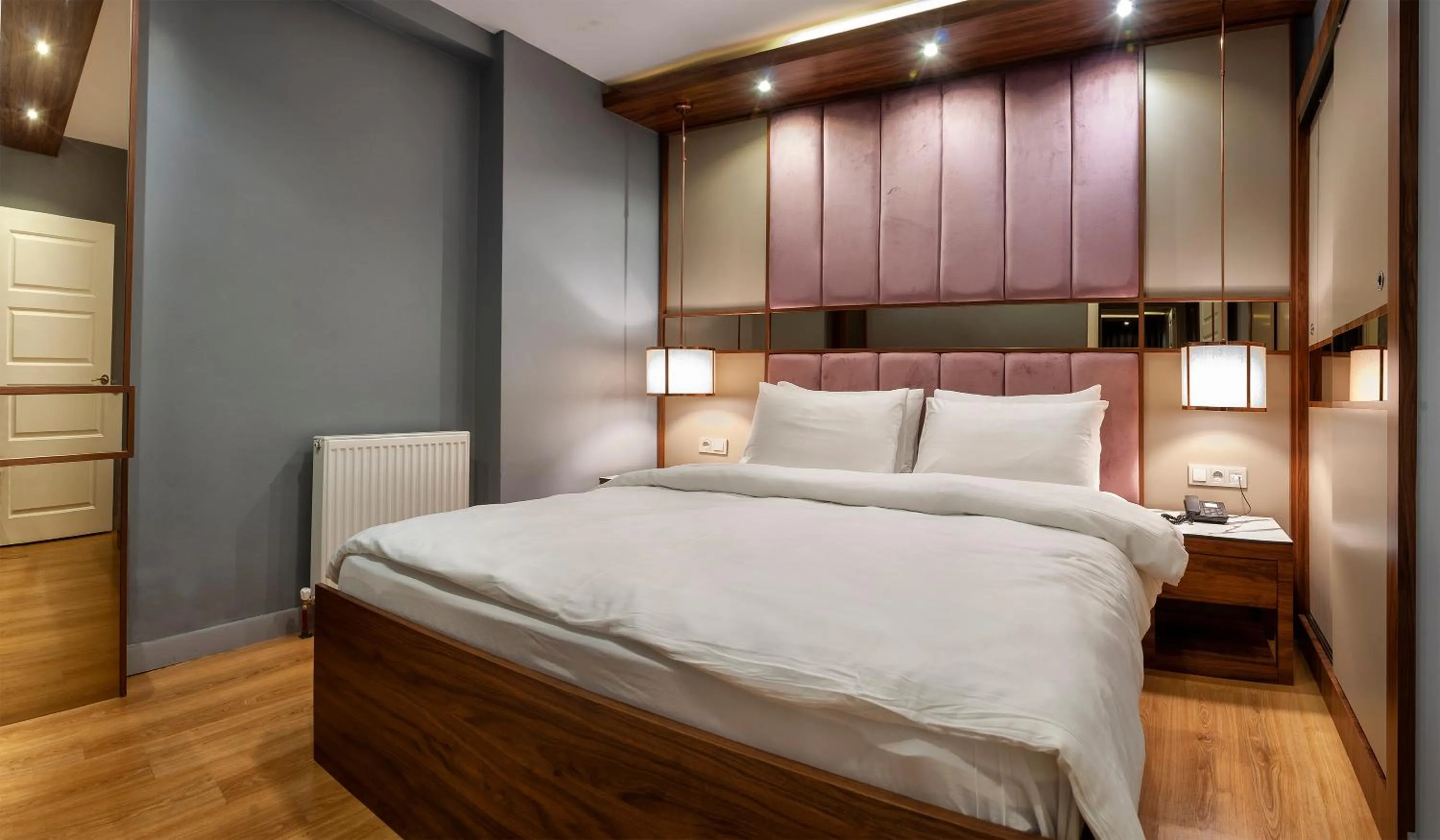 Bed in Vitabella Suites