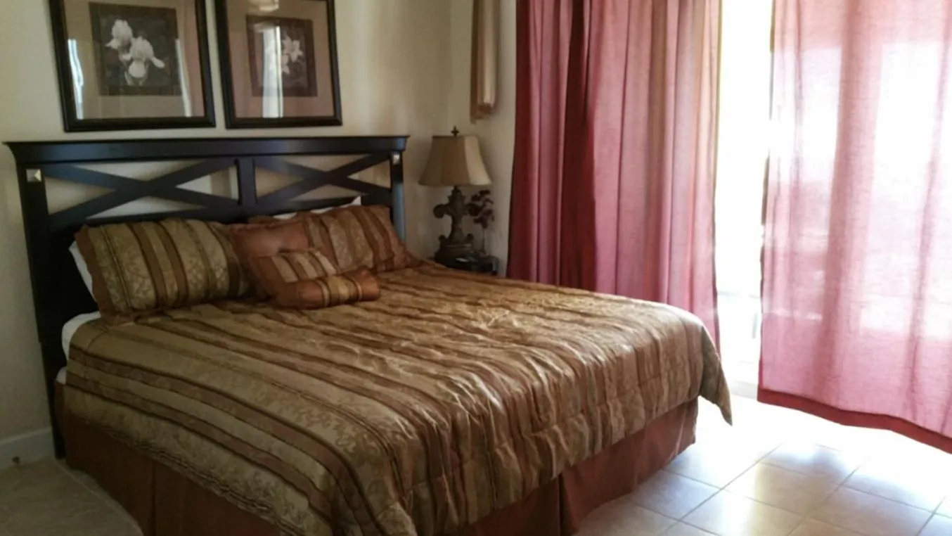 Bed in Tropic Winds Condo