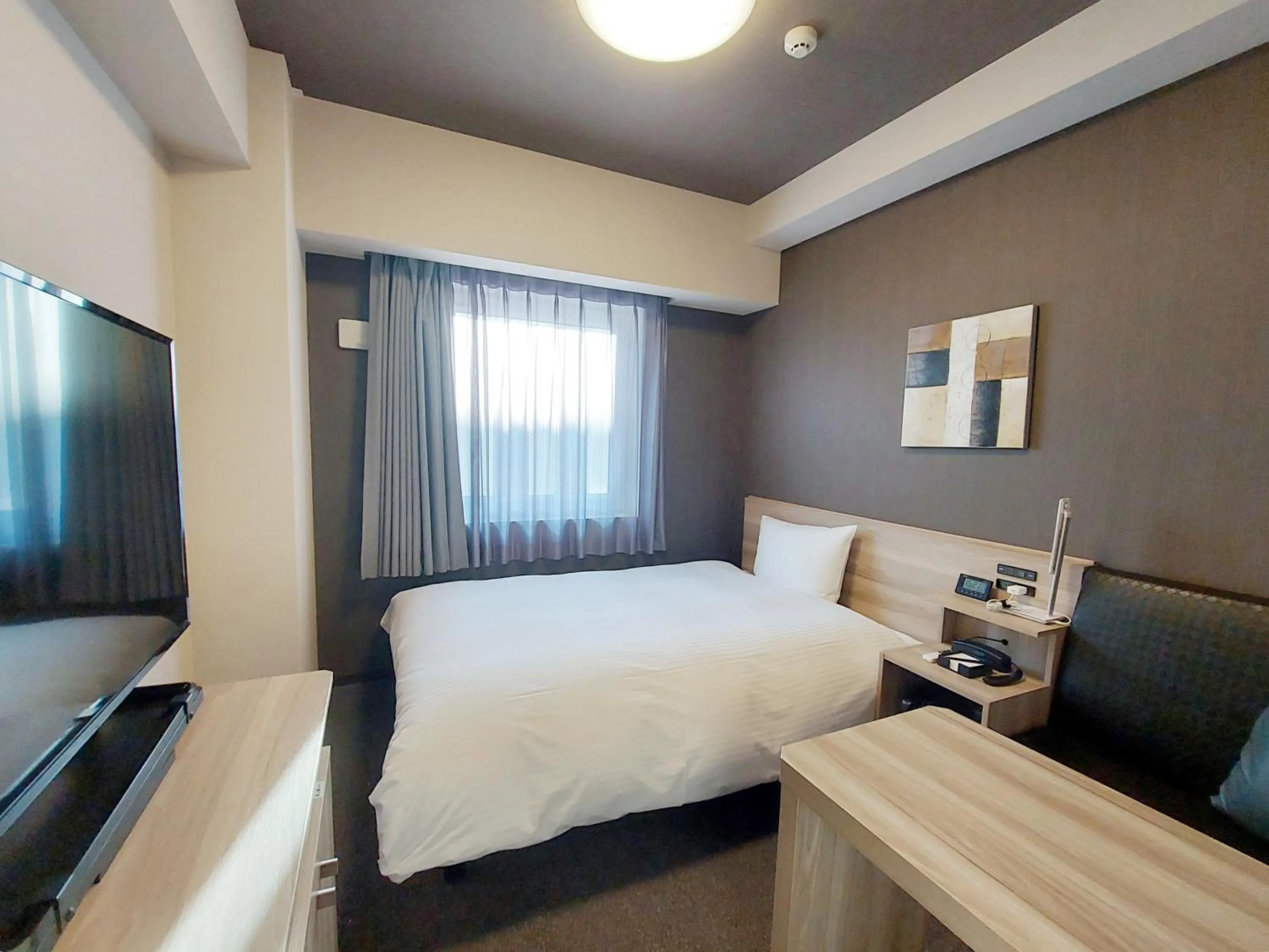 Photo of the whole room, Bed in Hotel Route Inn Kusatsu Ritto -Ritto Inter Kokudo 1 gou-