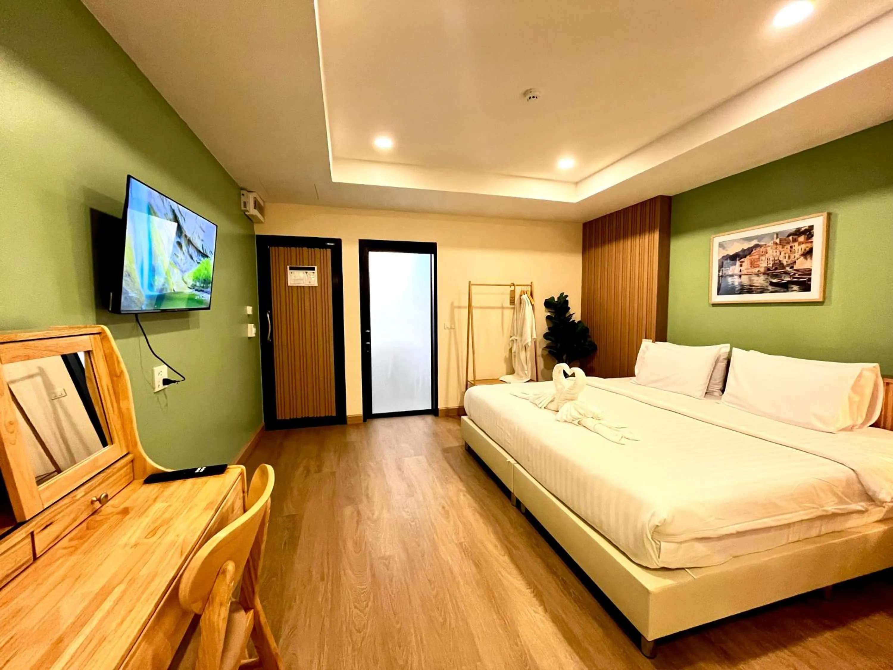 Communal lounge/ TV room, Bed in USABAI Riverside Boutique Hotel