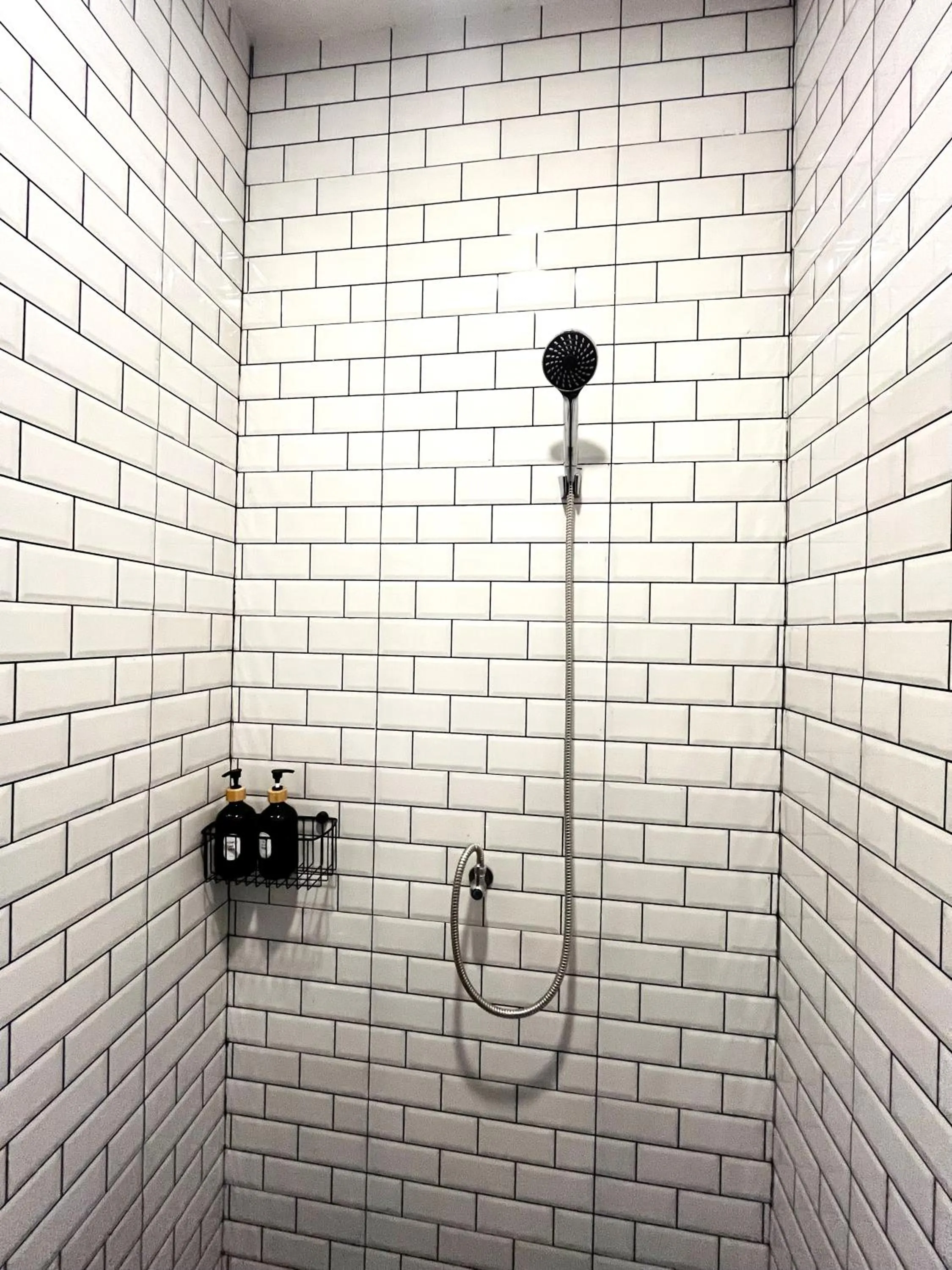 Shower in USABAI Riverside Boutique Hotel