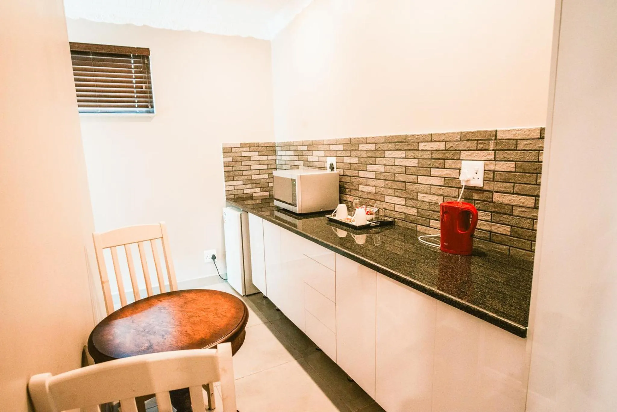 Kitchen or kitchenette in Le Grant Guesthhouse