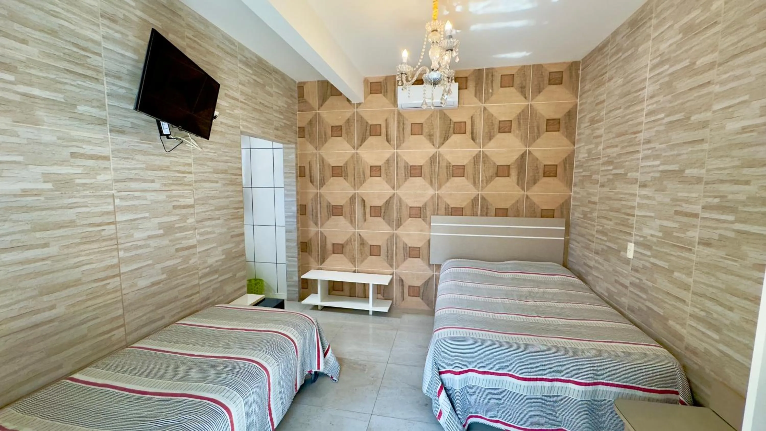 Bed in Hotel das Palmas