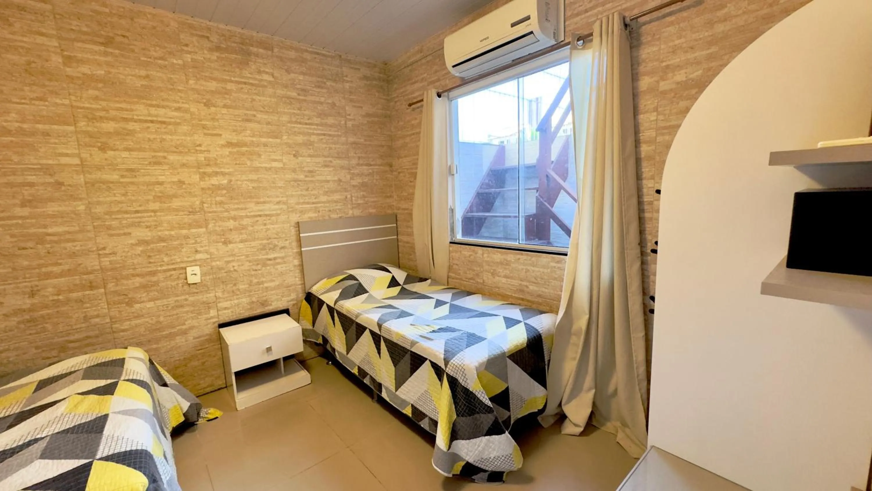 Bed in Hotel das Palmas