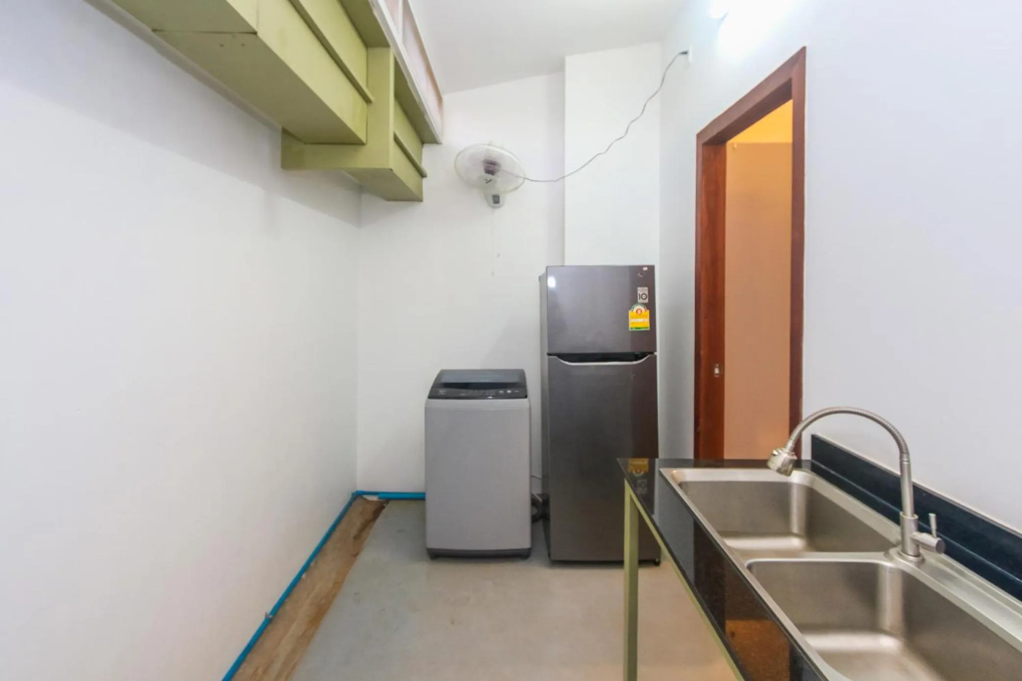 Kitchen or kitchenette in Phan NaTa Apartment