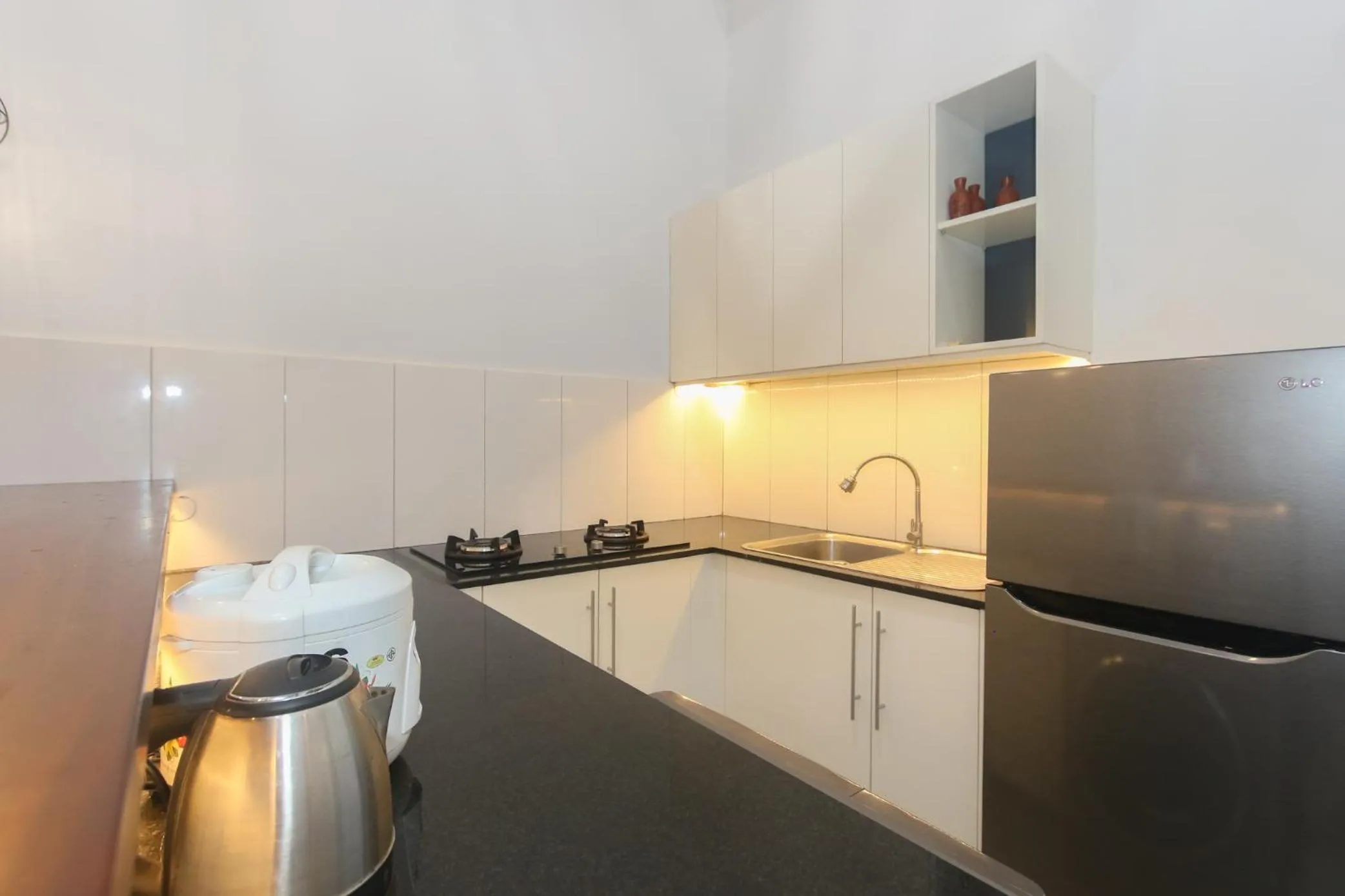 Kitchen or kitchenette in Phan NaTa Apartment