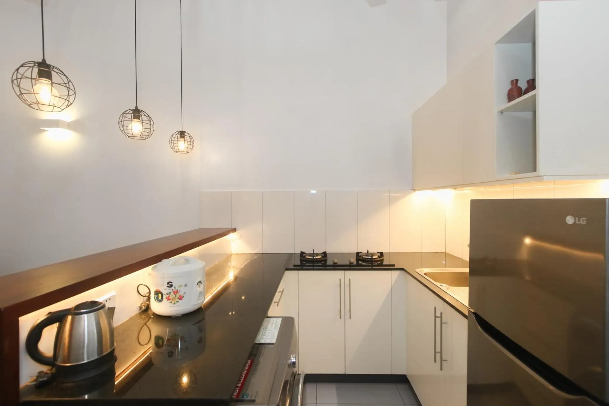 Kitchen or kitchenette in Phan NaTa Apartment