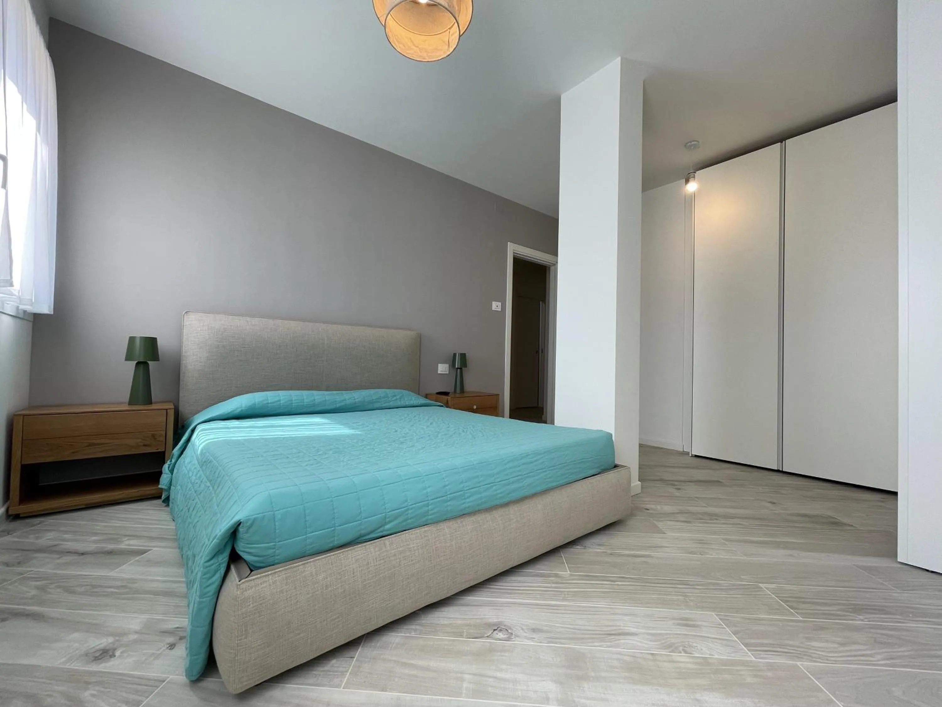 Bed in Gli Scogli Luxury Residence Hotel