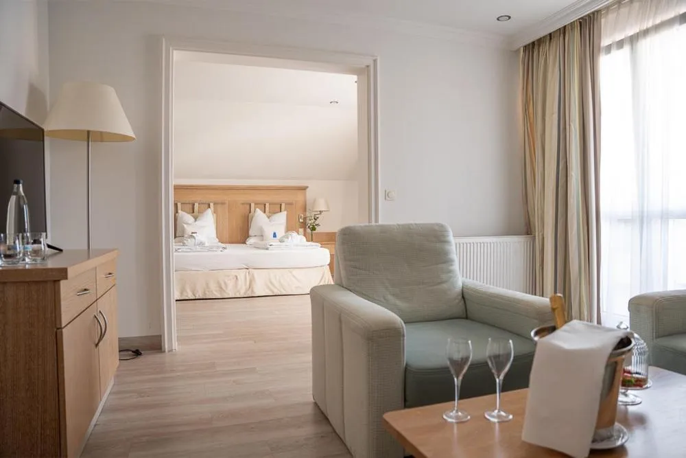 Bed in MAXIMILIAN Grand Hotel