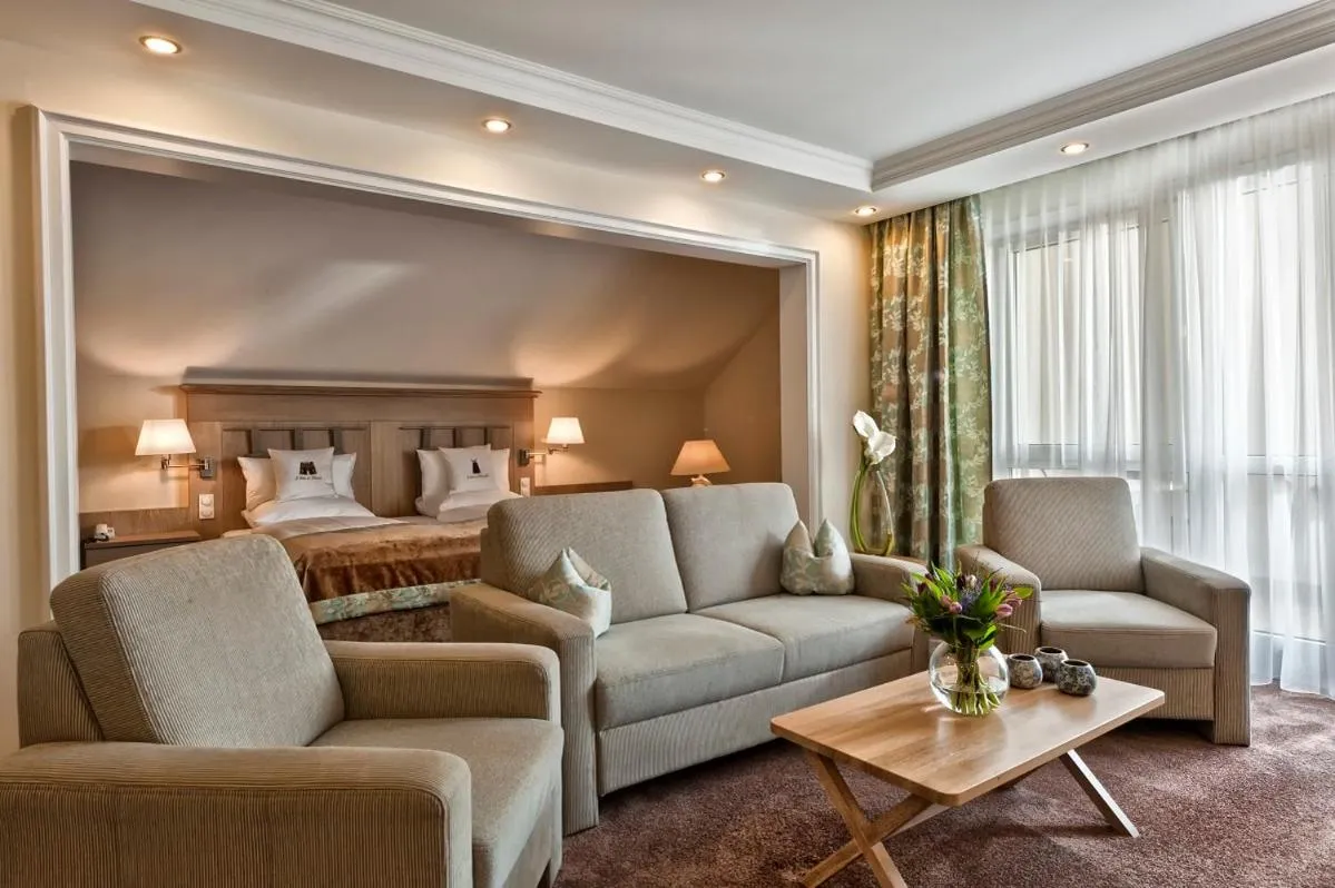 Bed in MAXIMILIAN Grand Hotel