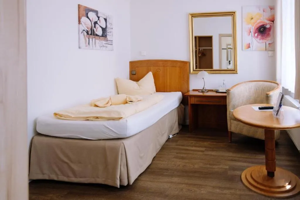 Bed in SCHULZENS Brauerei & Hotel