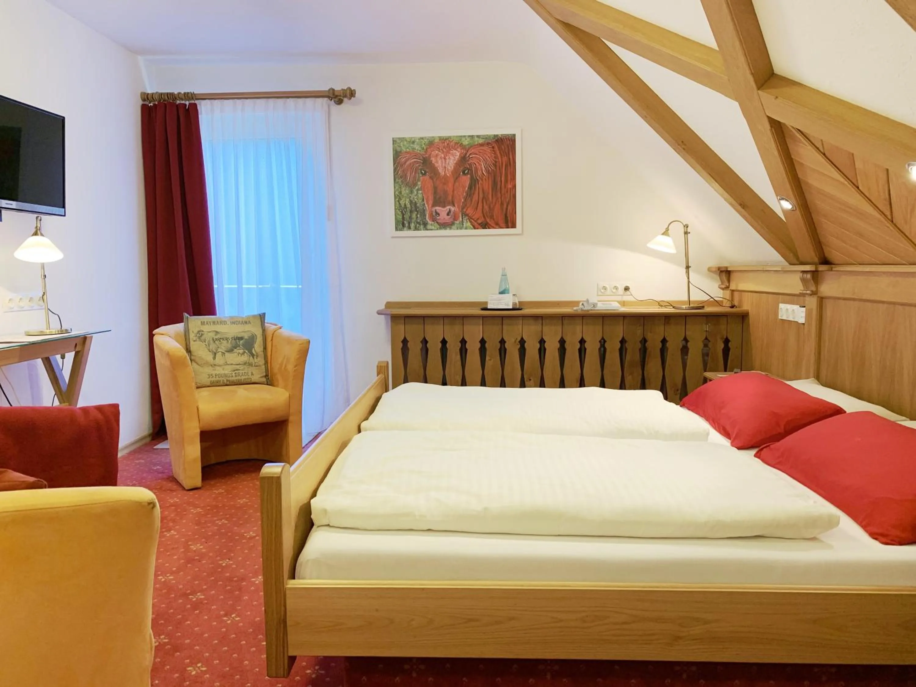Photo of the whole room, Bed in Landhotel Untere Kapfenhardter Mühle