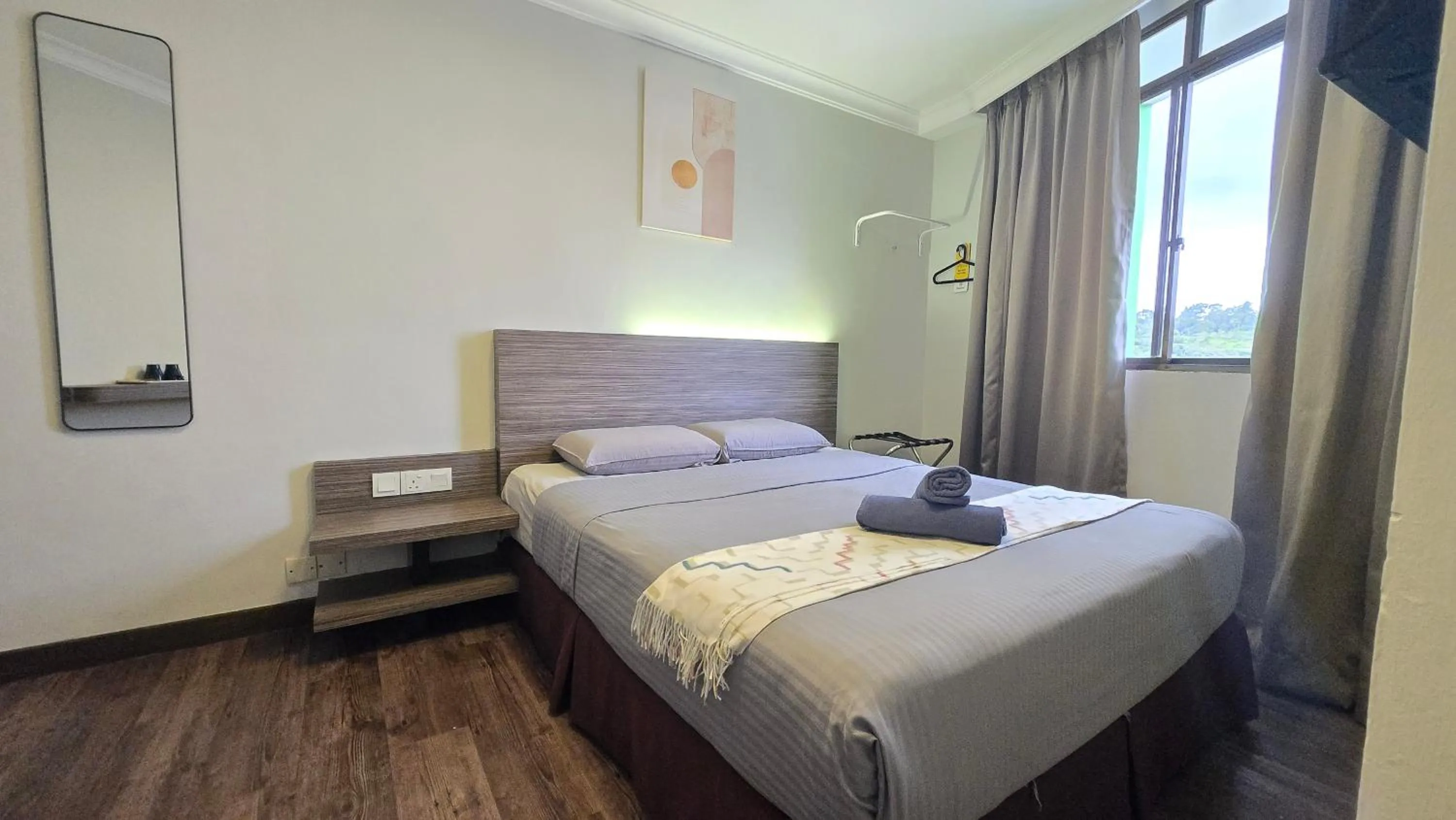 Bed in Parkland Hotel