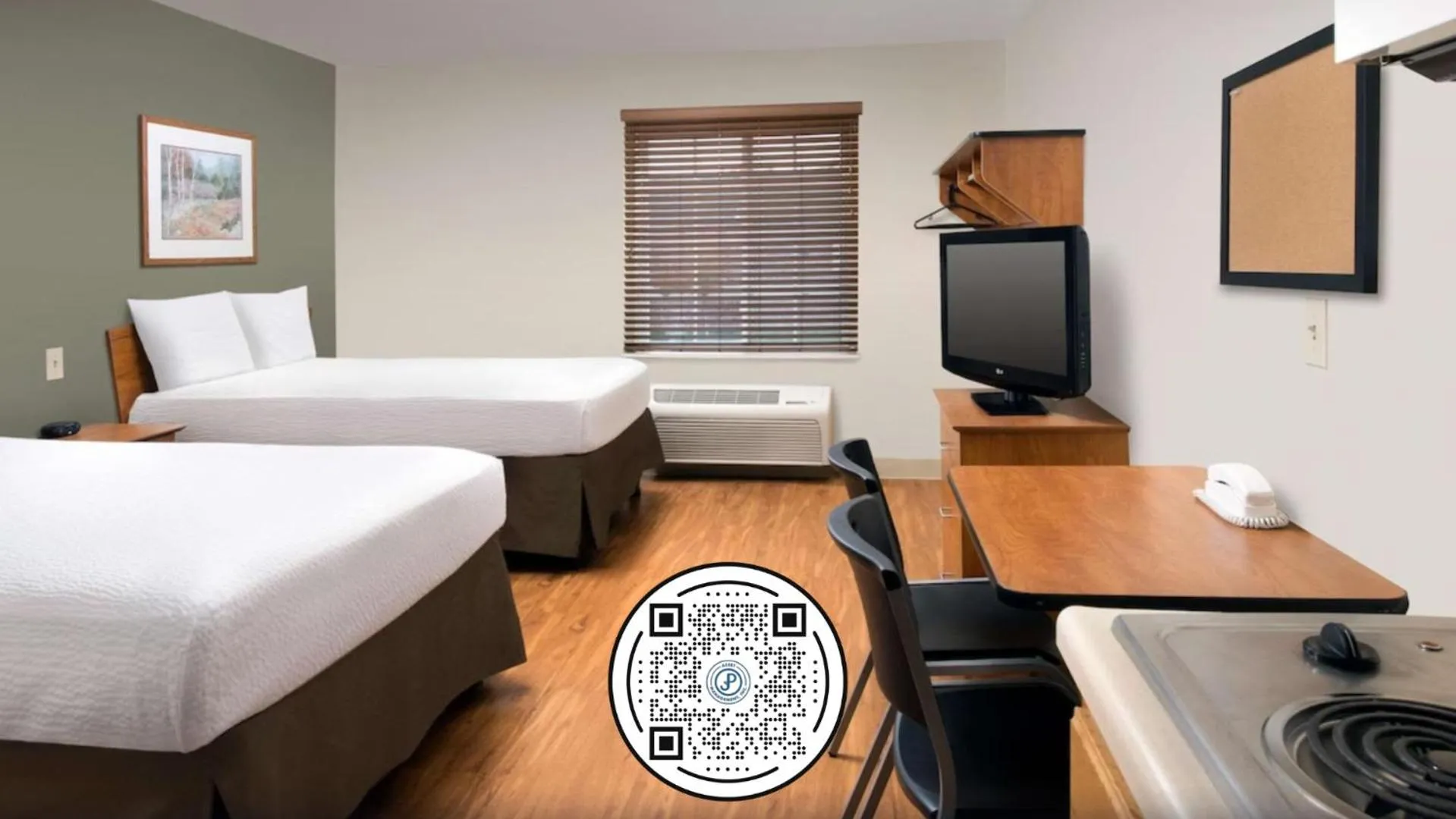 Photo of the whole room, Bed in WoodSpring Suites St Louis Arnold