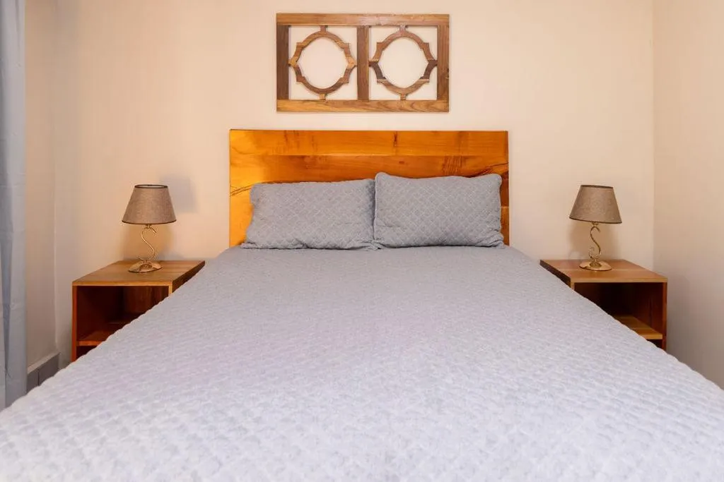 Photo of the whole room, Bed in Hotel Palmazul - Viña del Mar