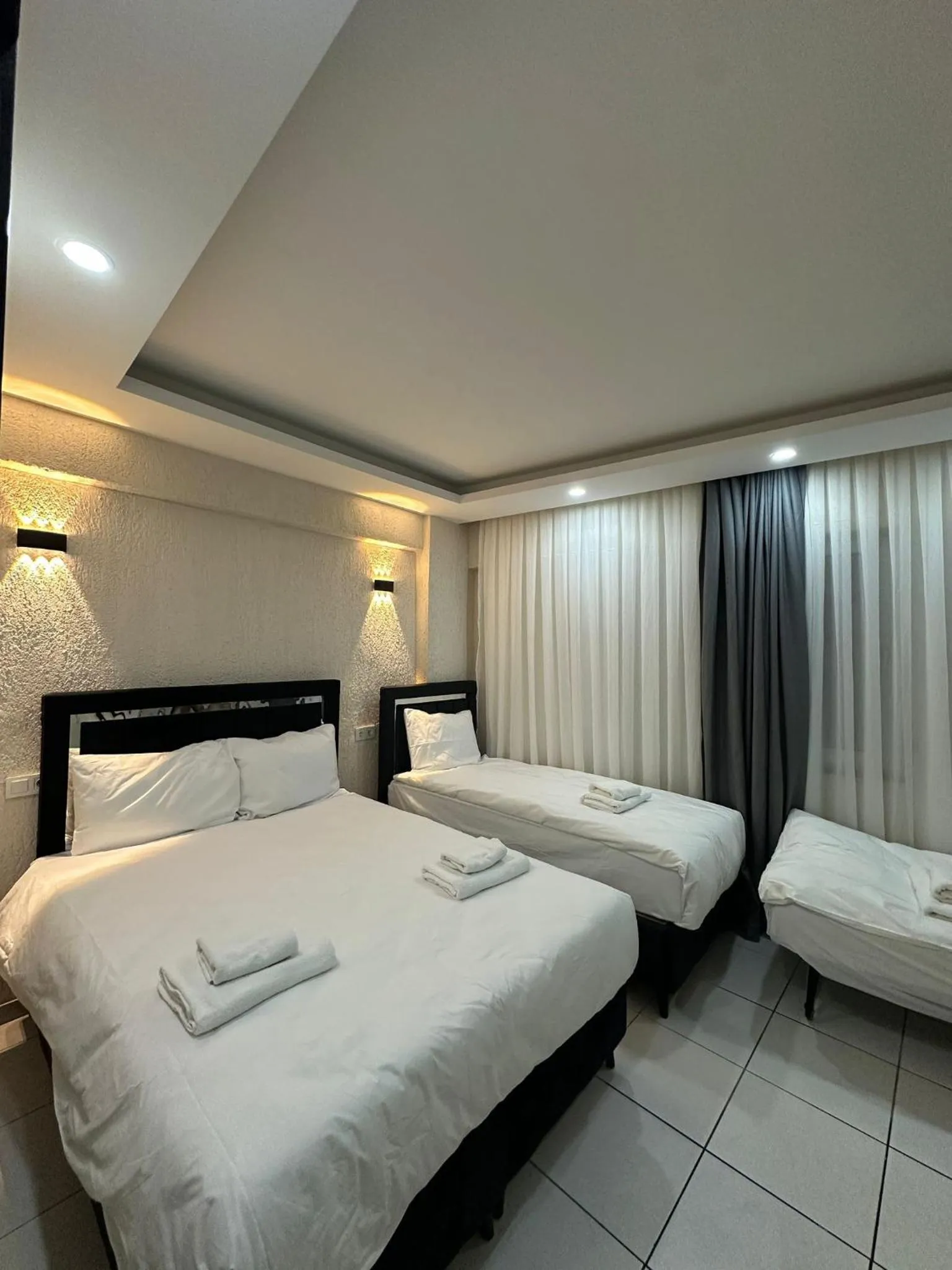 Bed in Mitra Downtown Hotel