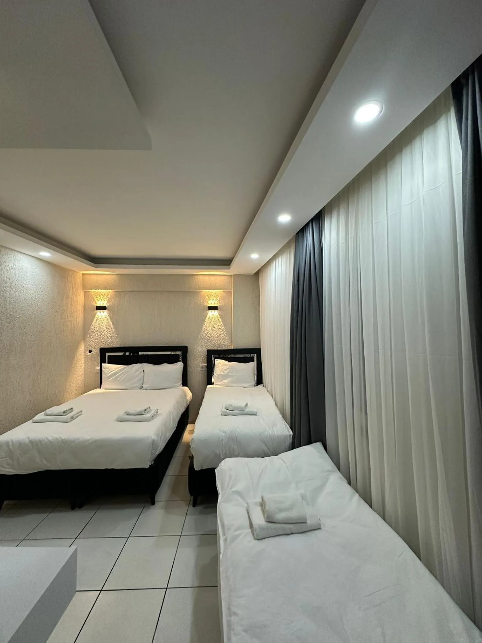 Bed in Mitra Downtown Hotel