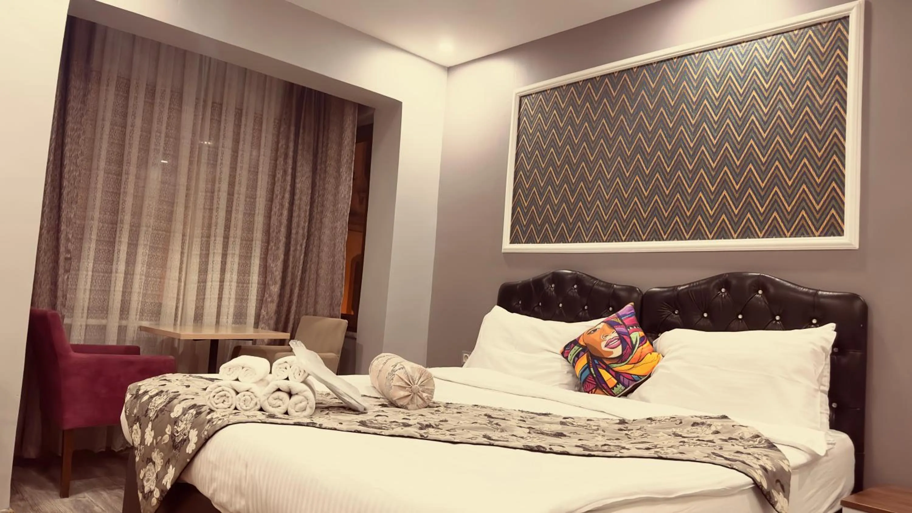 Bed in Mitra Downtown Hotel