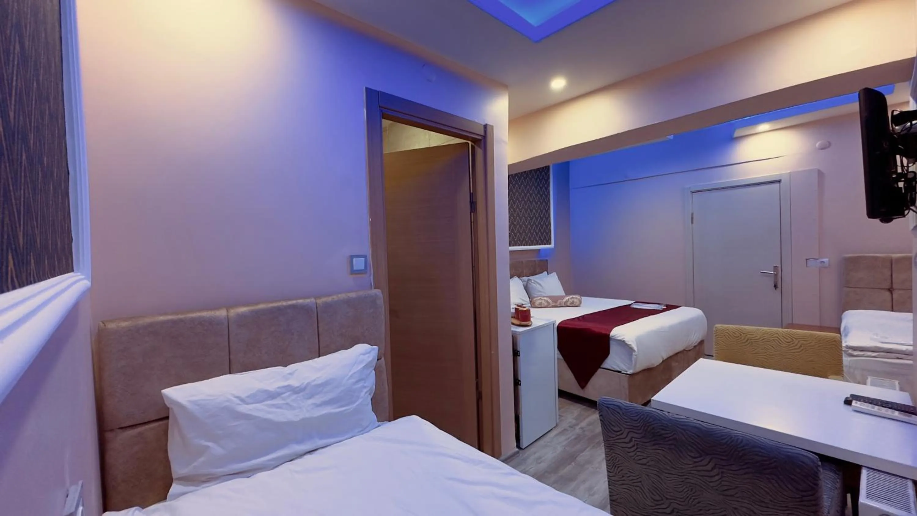 Bed in Mitra Downtown Hotel