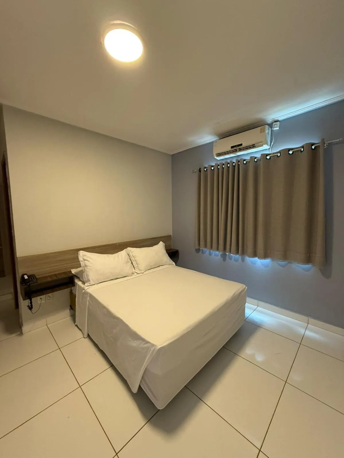 Bed in PUMMA BUDGET HOTEL