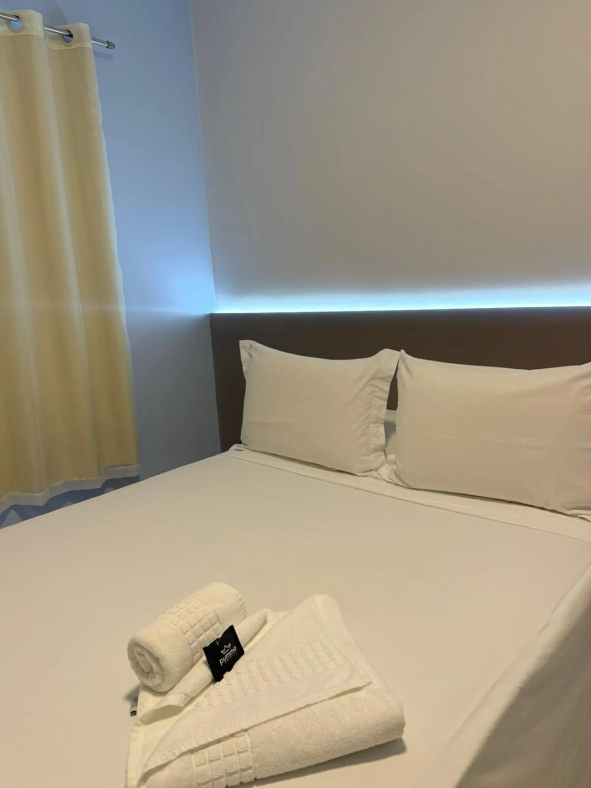 Bed in PUMMA BUDGET HOTEL