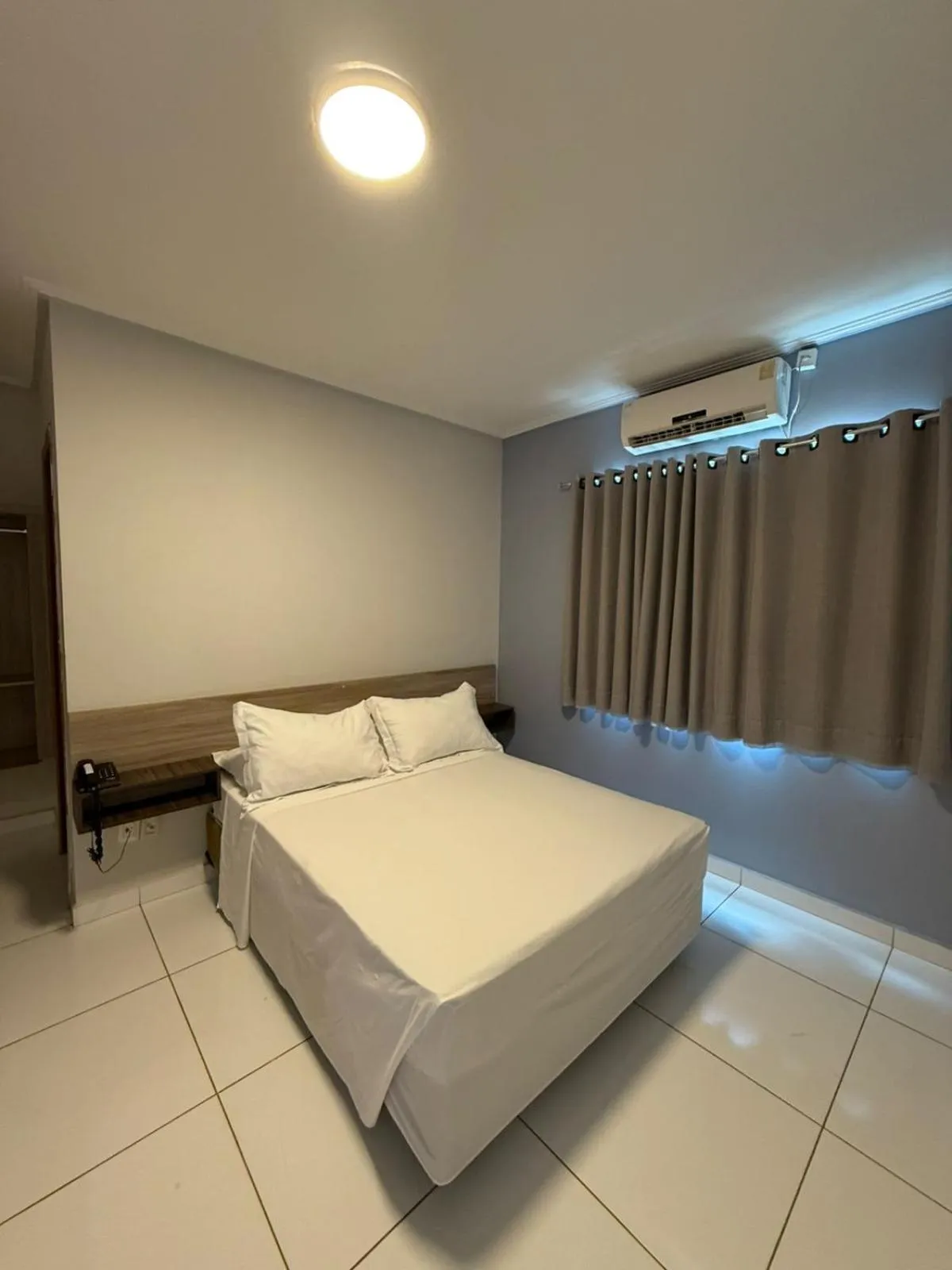 Bed in PUMMA BUDGET HOTEL