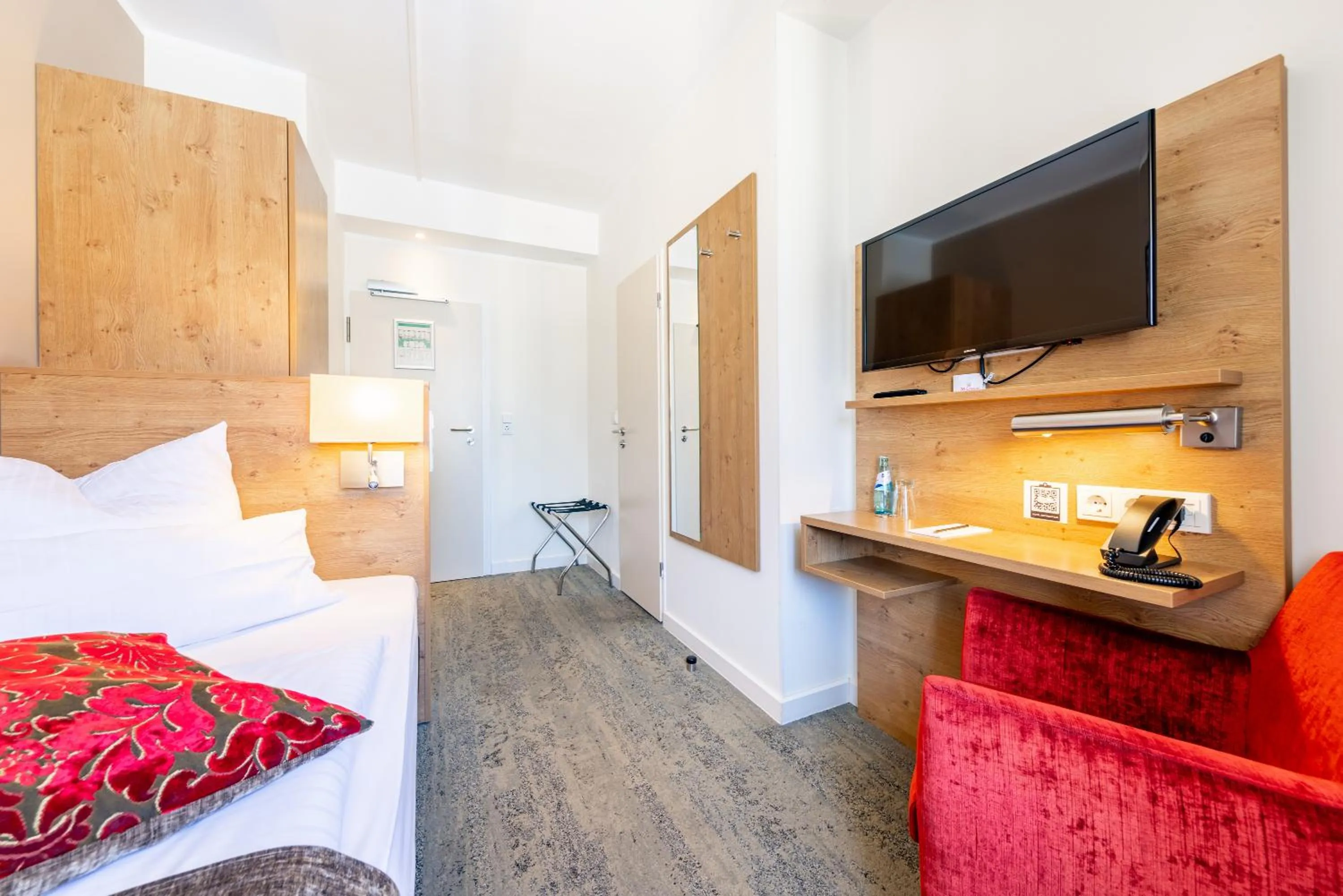 Bed in Maingau Hotel