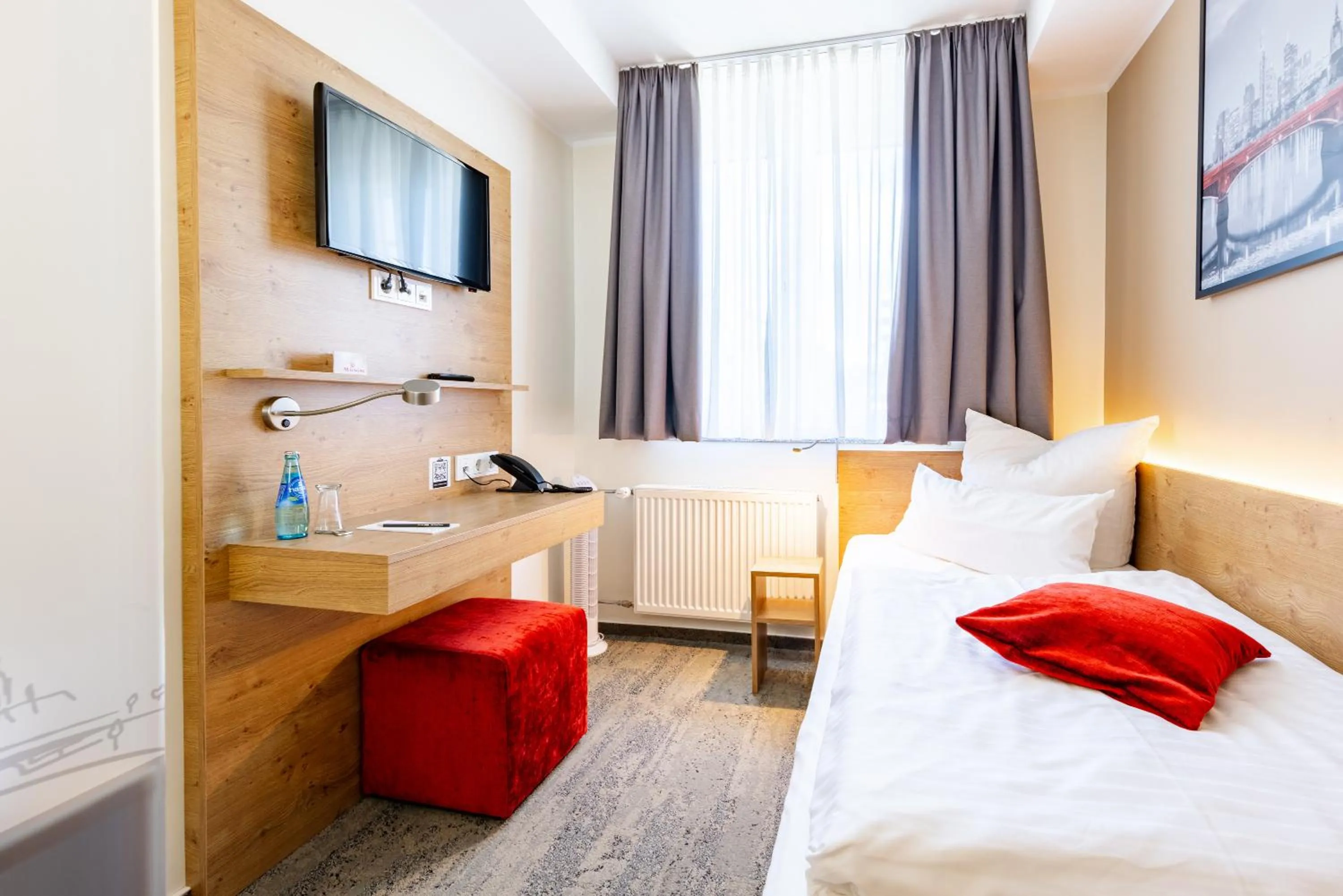 Bed in Maingau Hotel