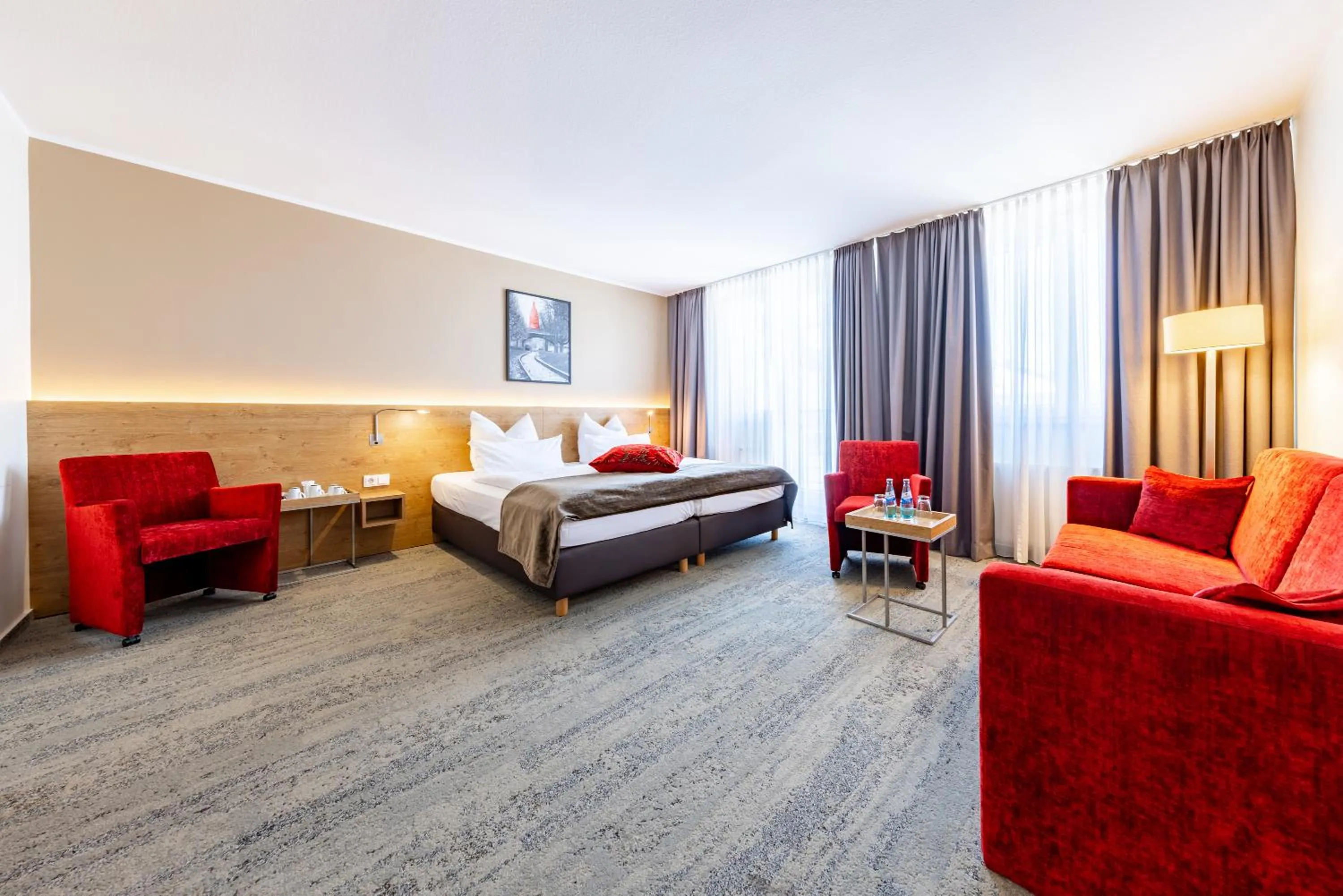 Photo of the whole room, Bed in Maingau Hotel