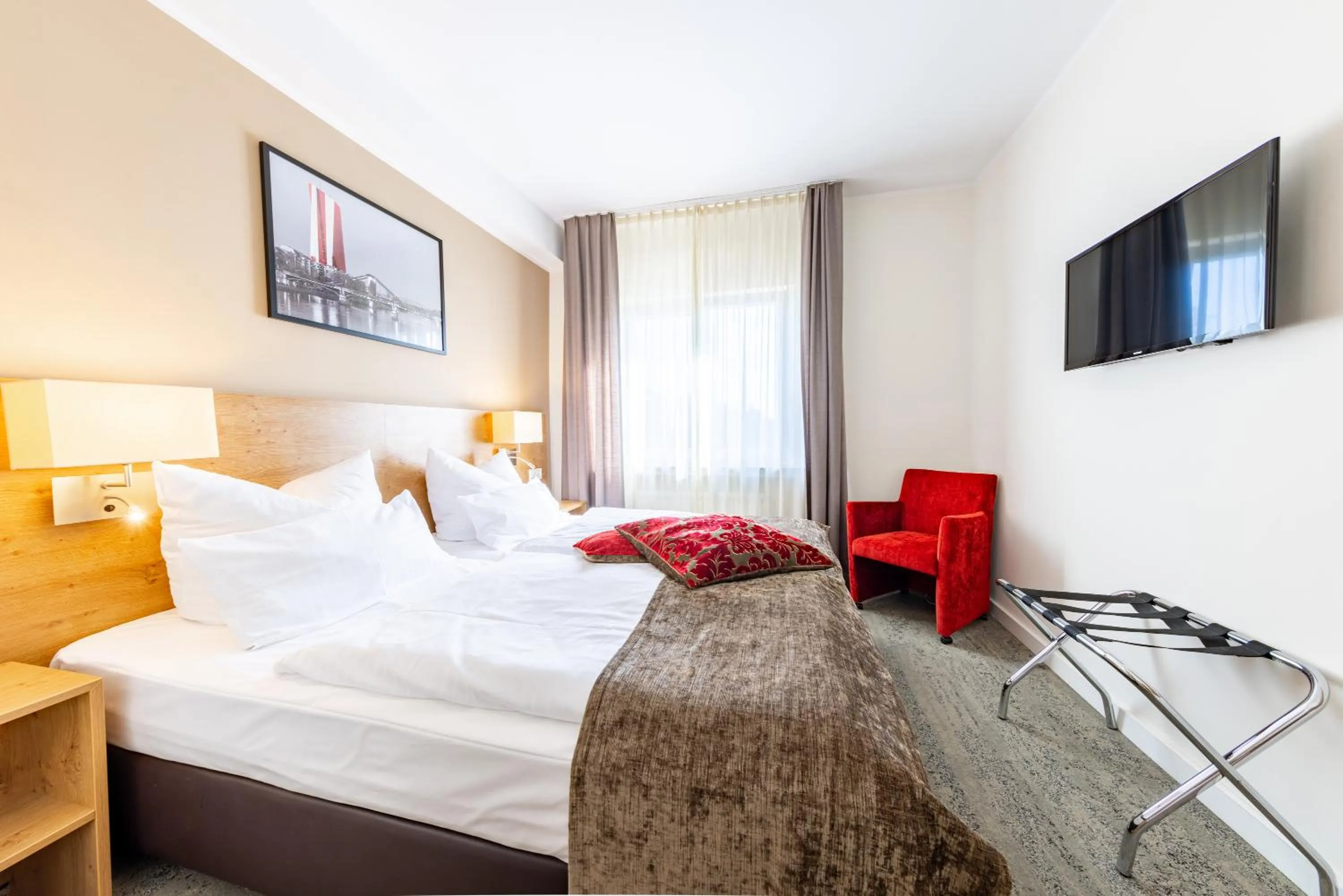 Bed in Maingau Hotel