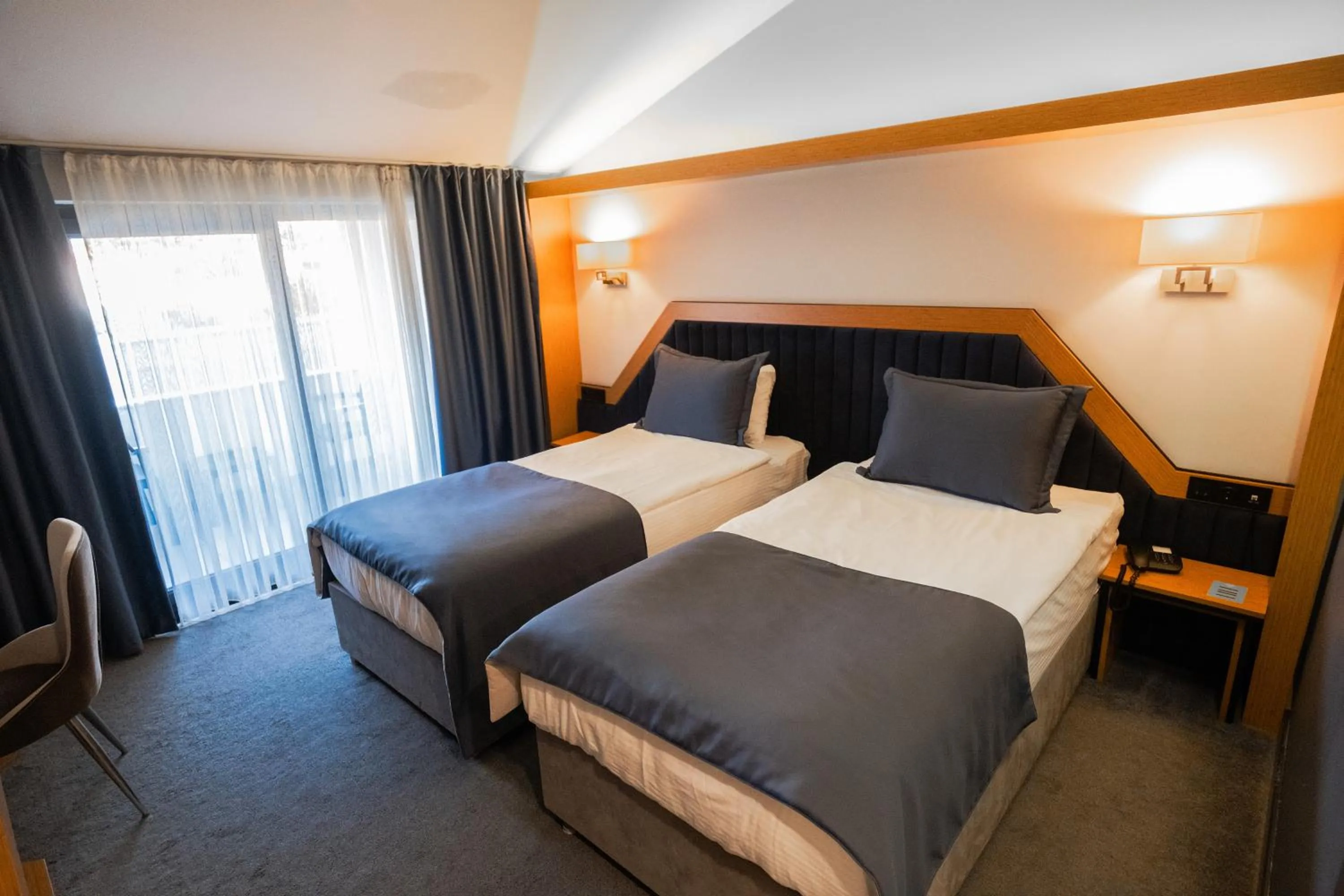 Bed in Roof 264 Hotel & Suites