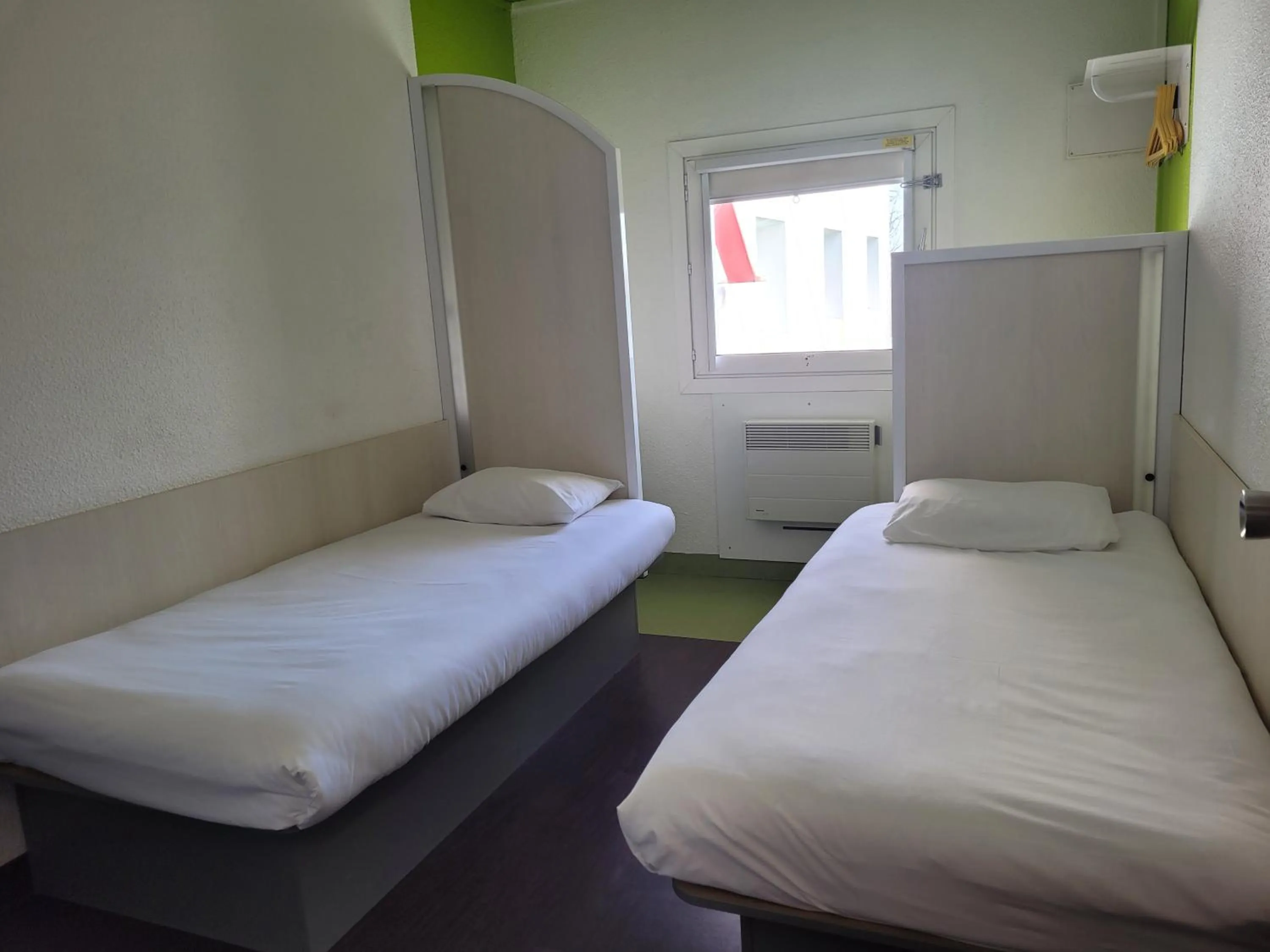 Photo of the whole room, Bed in TIP HOTEL CAMBRAI ex HOTEL F1