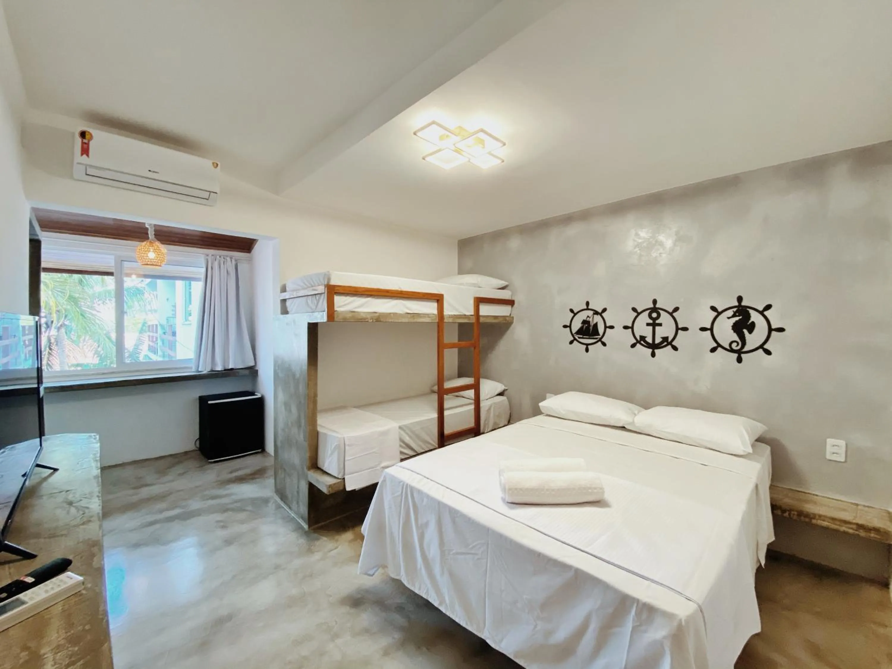 Bed in Pousada Primeira Praia Suítes