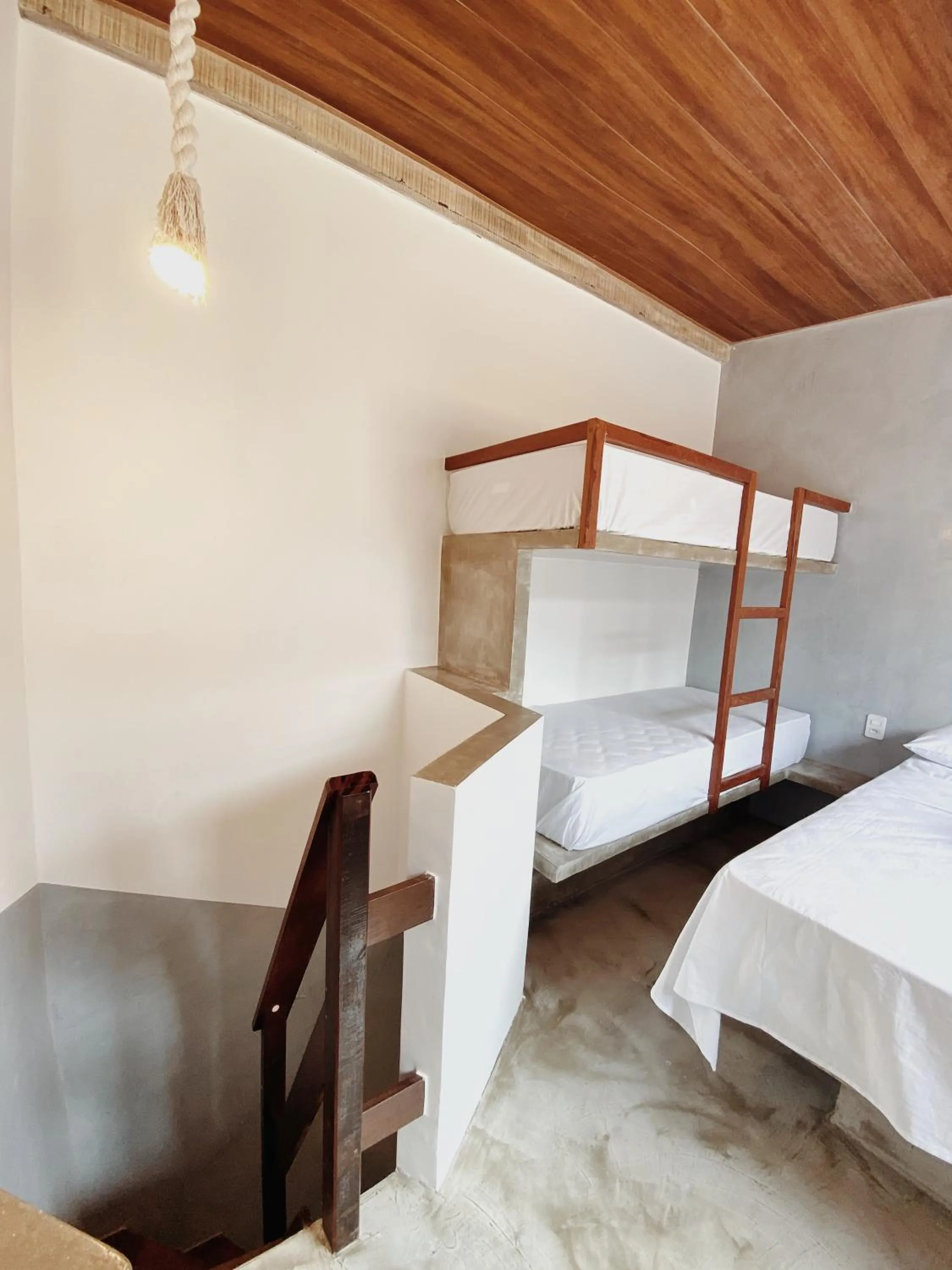 Bed in Pousada Primeira Praia Suítes