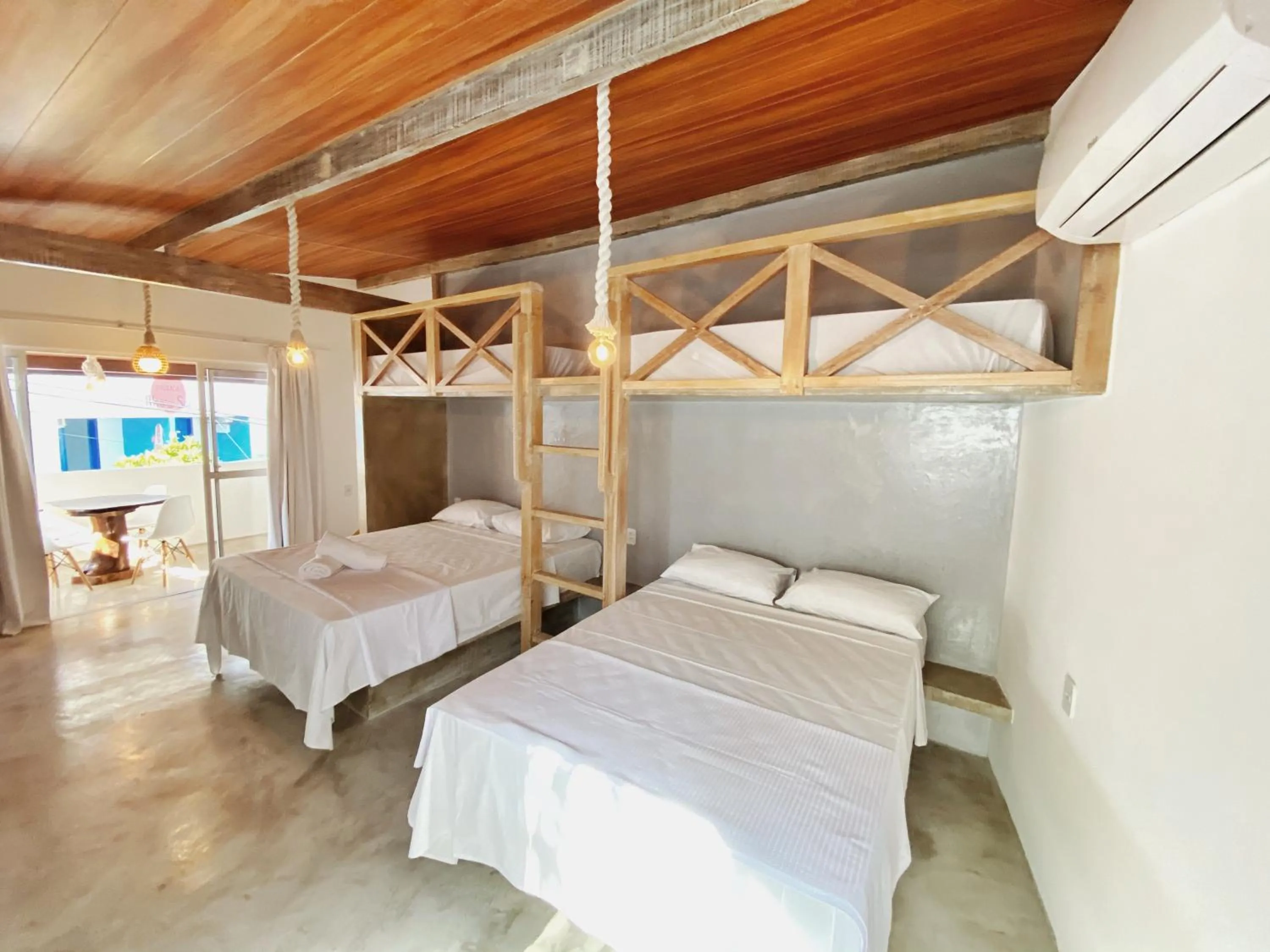 Bed in Pousada Primeira Praia Suítes