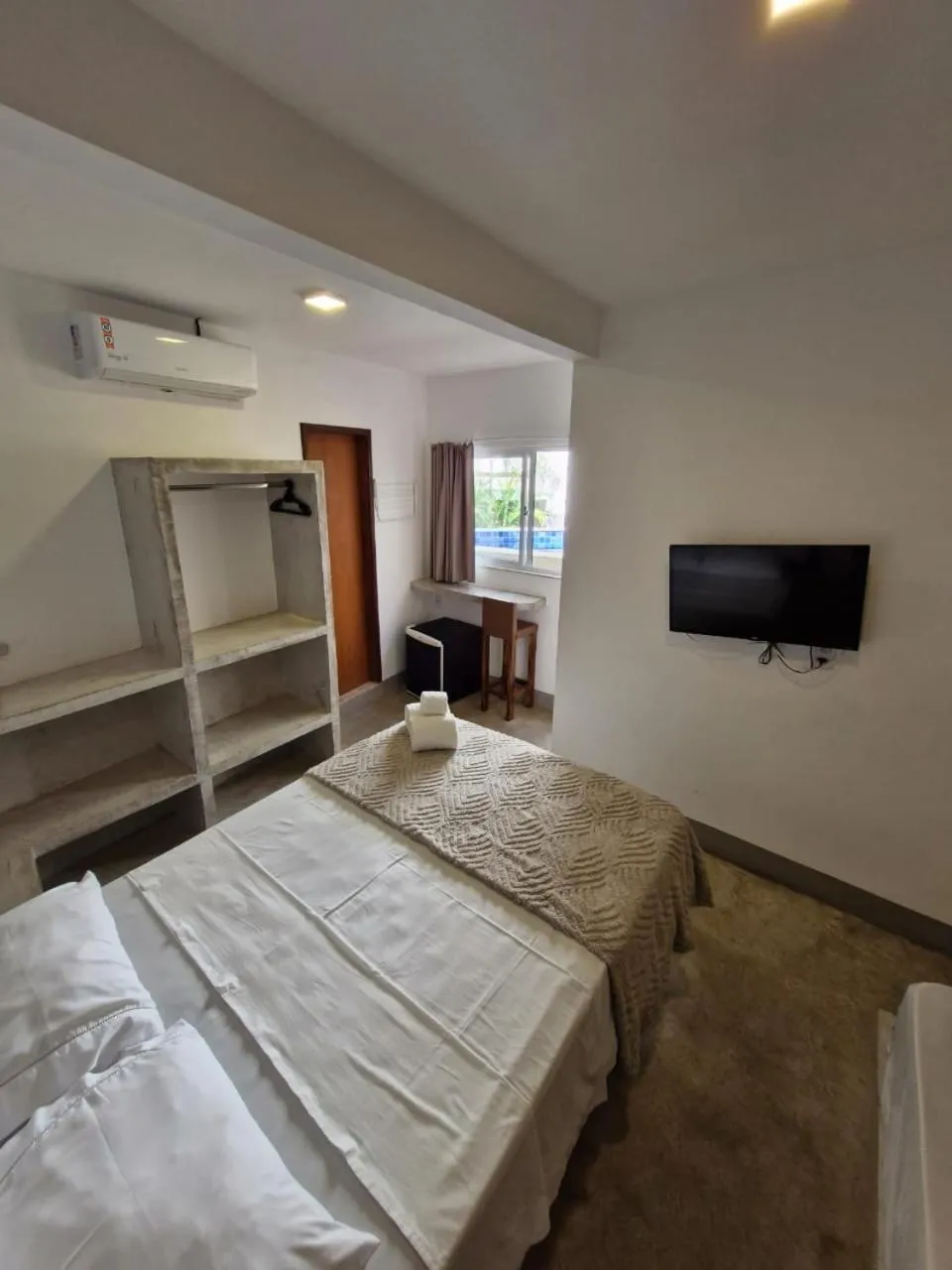 Bed in Pousada Primeira Praia Suítes