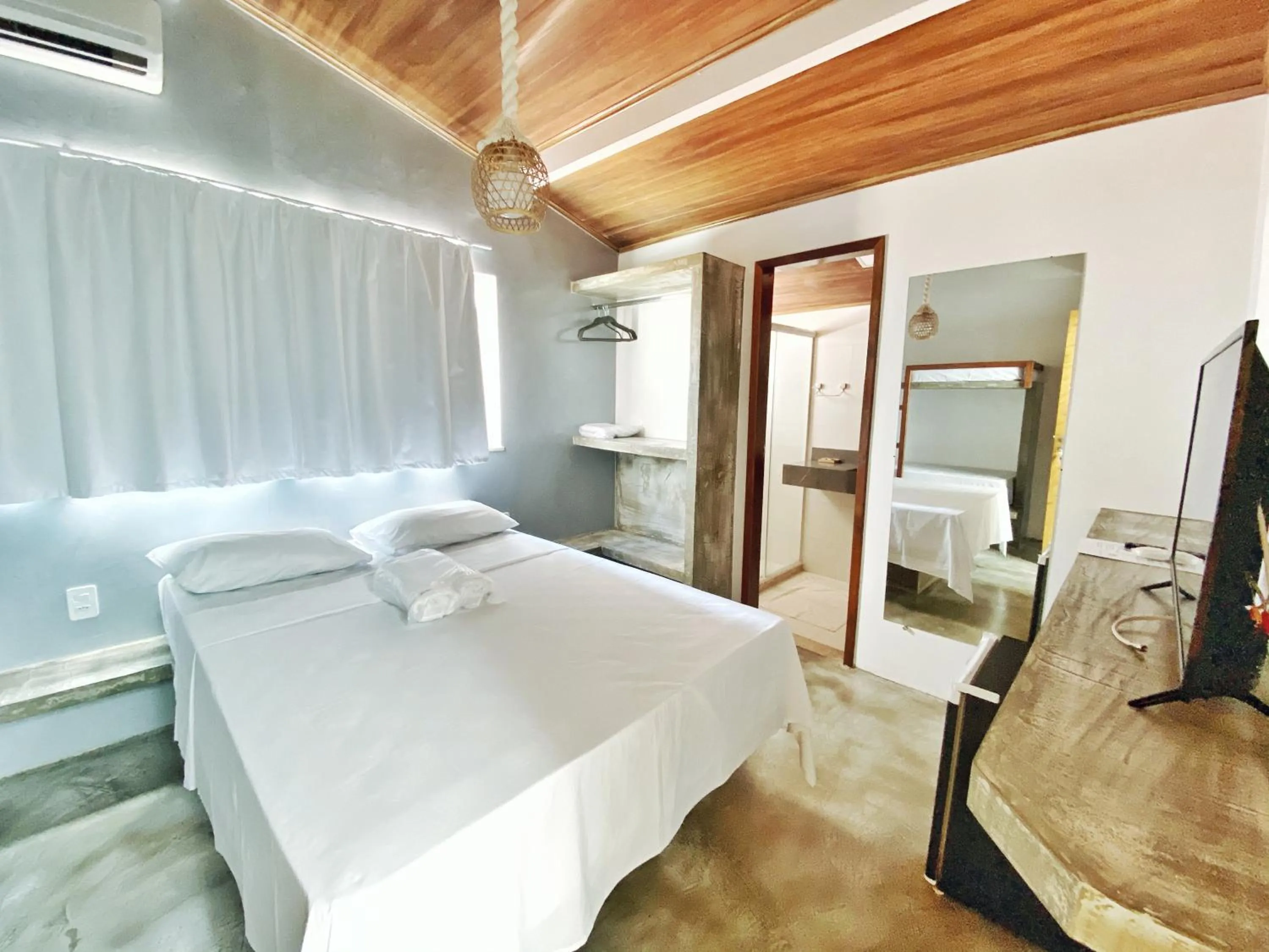 Bed in Pousada Primeira Praia Suítes