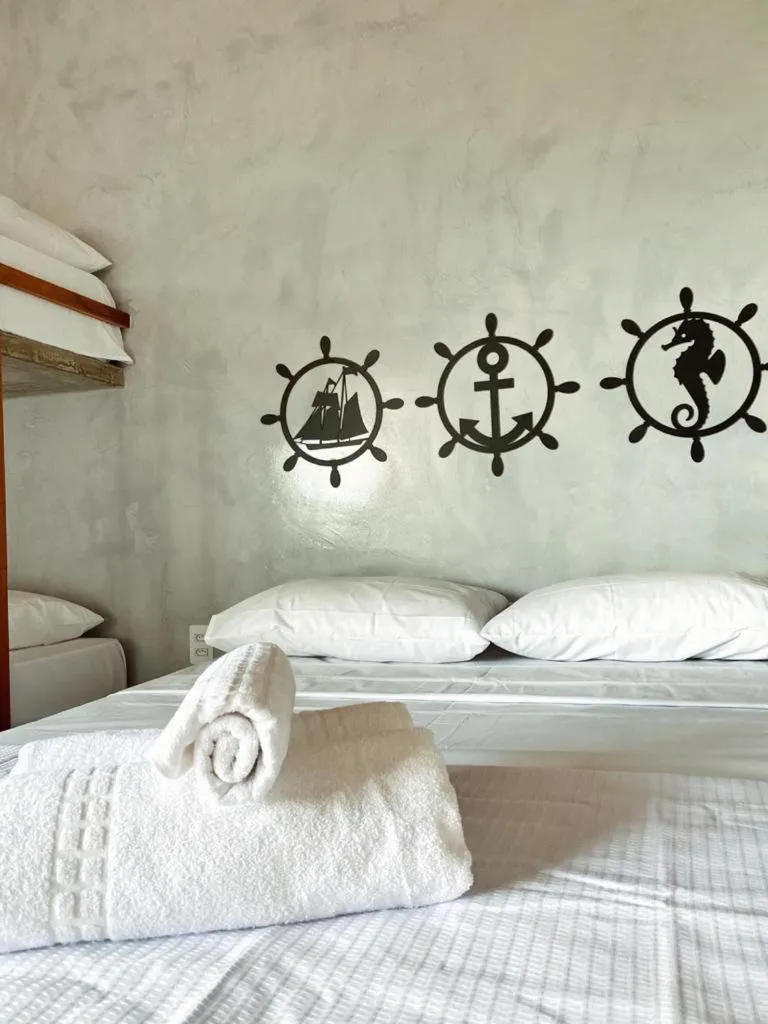 Bed in Pousada Primeira Praia Suítes
