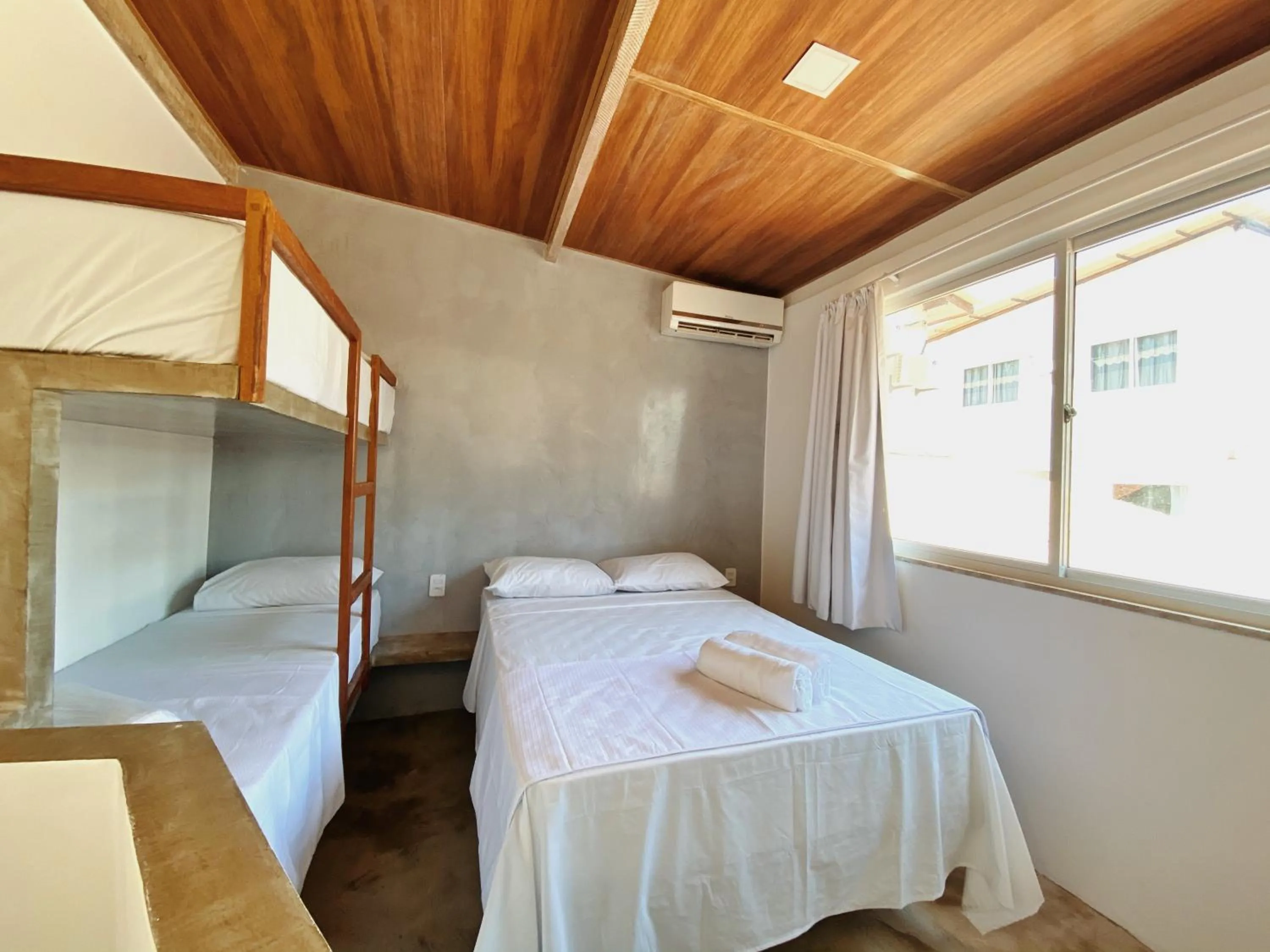 Bed in Pousada Primeira Praia Suítes