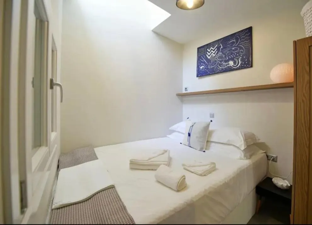 Bed in NESEA Boutique Apartments