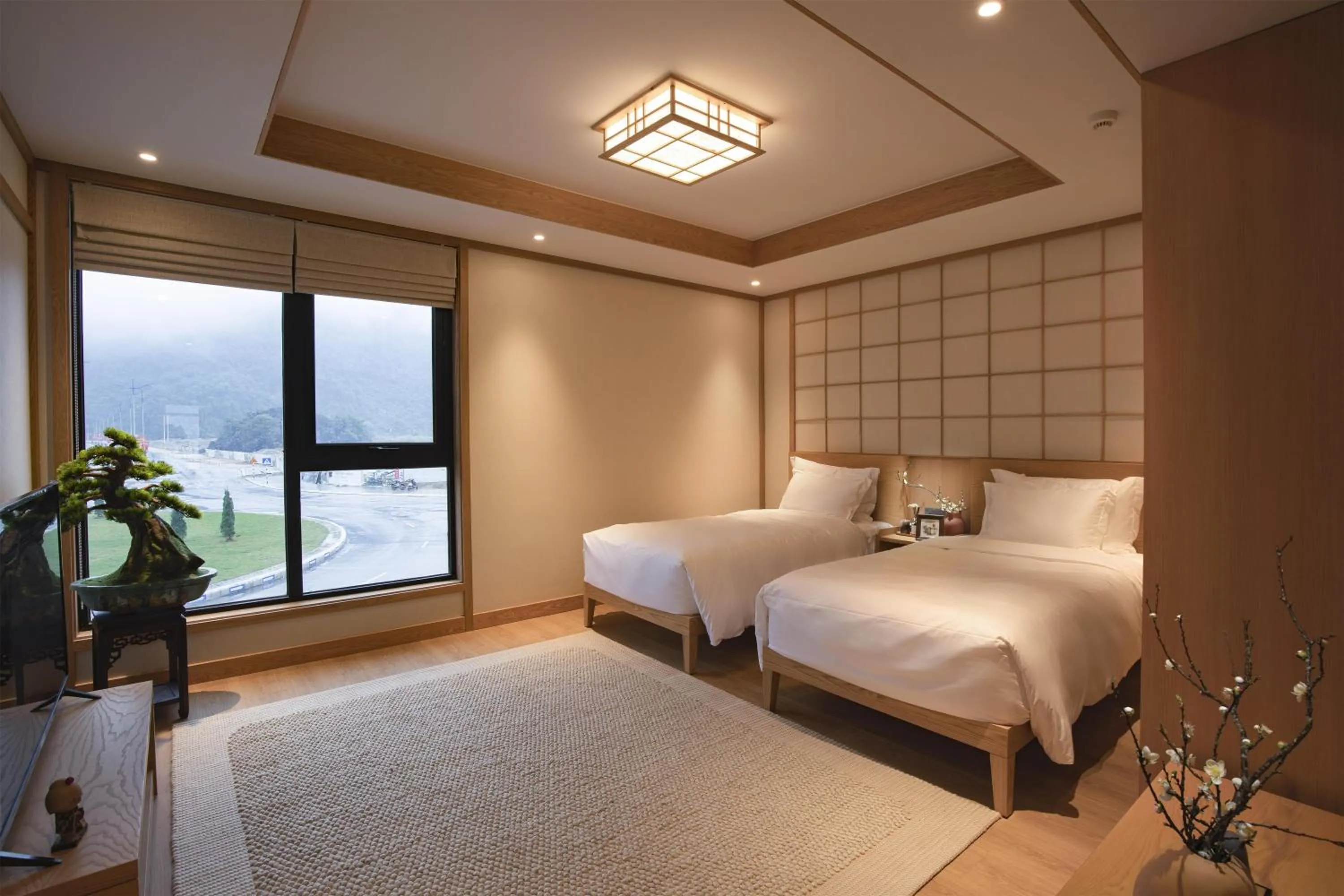 Bed in Hilton Quang Hanh Onsen Resort