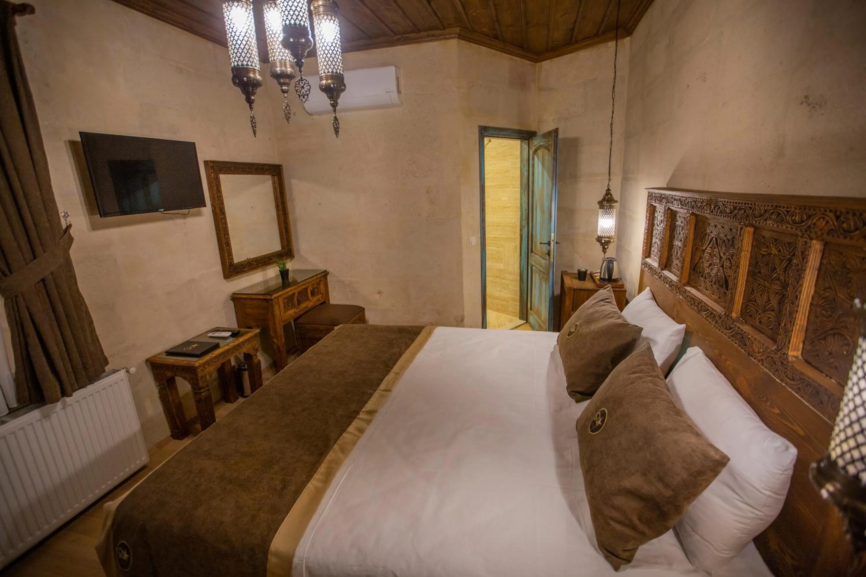 Bed in Sinasos Star Hotel Cappadocia