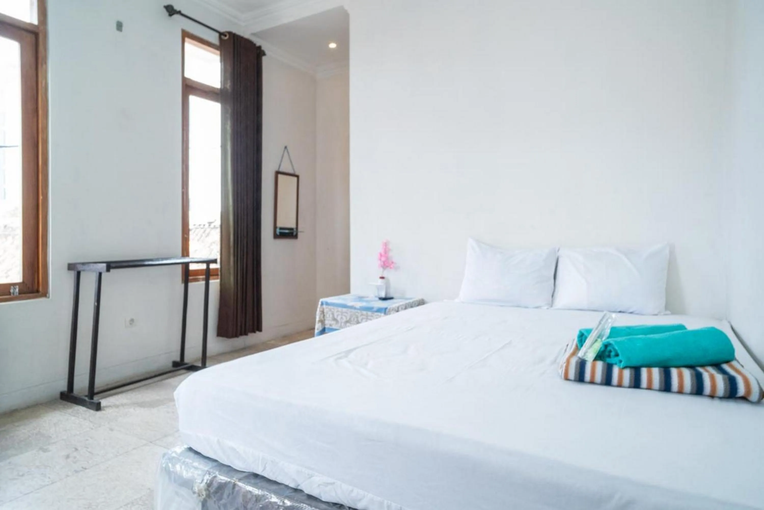 Bedroom, Bed in Rejeki Homestay Syariah Malioboro RedPartner