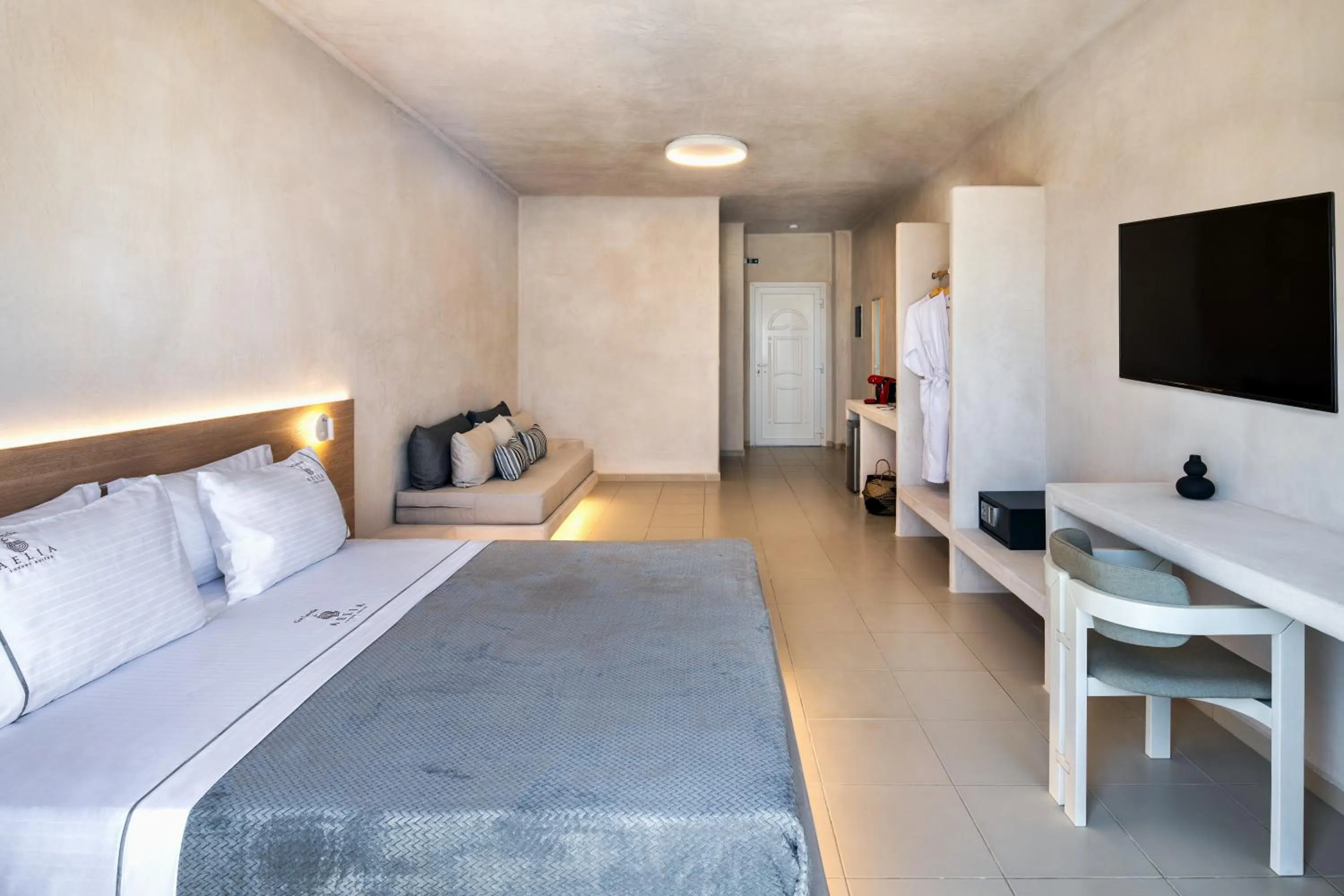 Bed in Aelia Luxury Suites